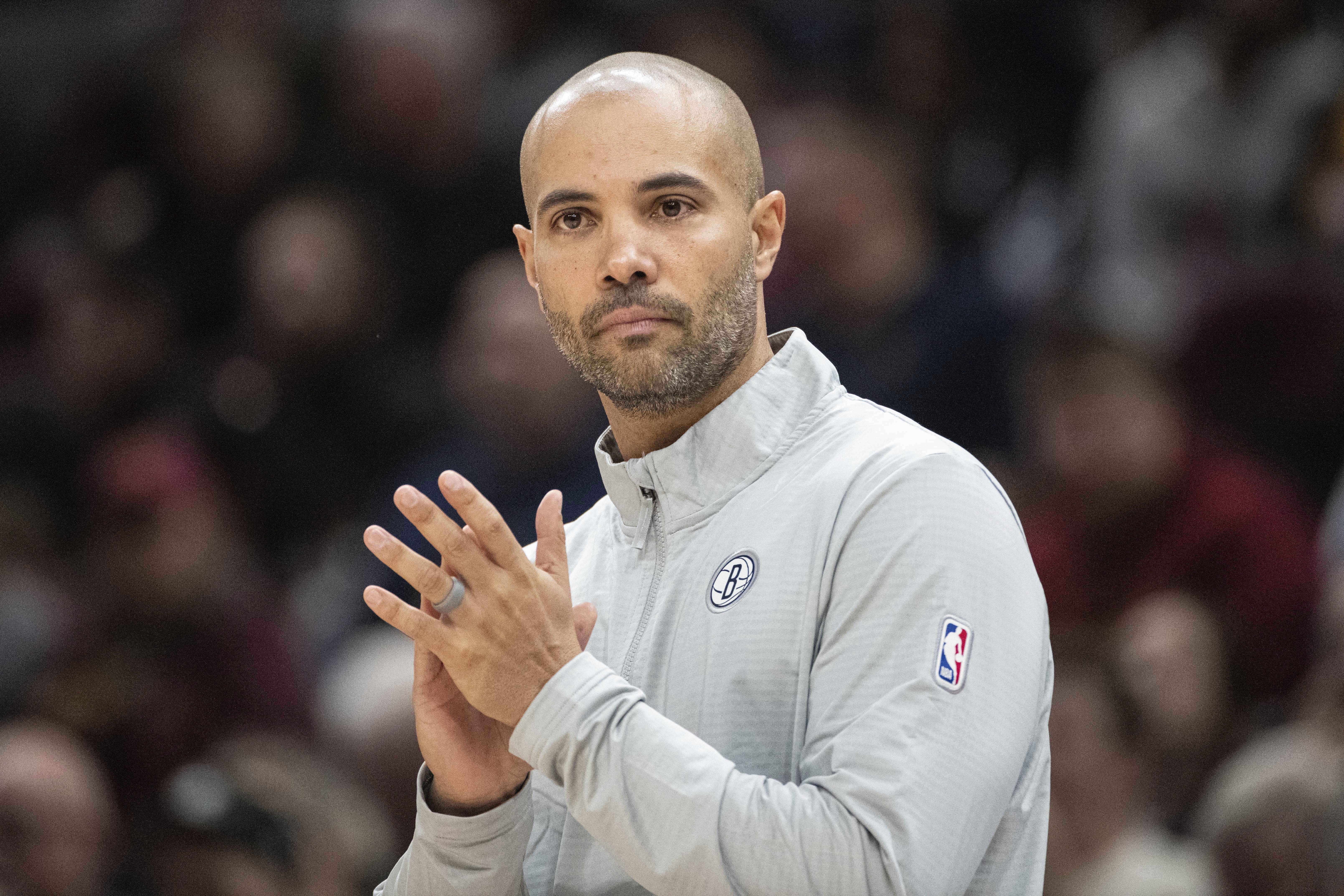 Brooklyn Nets head coach Jordi Fernandez applauds his team during the second half of an NBA basketball game against the Cleveland Cavaliers in Cleveland, Saturday, Nov 9, 2024.