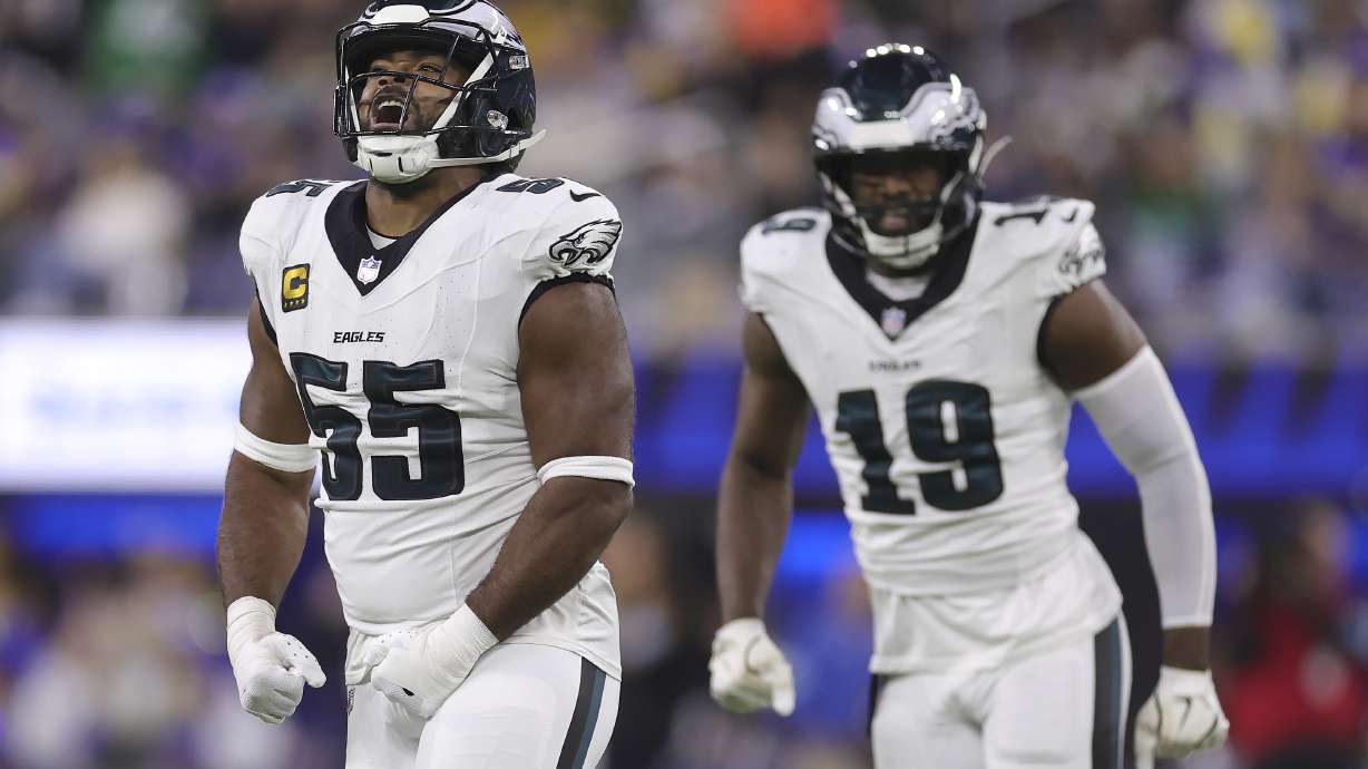 Philadelphia Eagles defensive end Brandon Graham (55) reacts with linebacker Josh Sweat (19) after sacking Los Angeles Rams quarterback Matthew Stafford during the first half of an NFL football game in Inglewood, Calif., Sunday, Nov. 24, 2024.