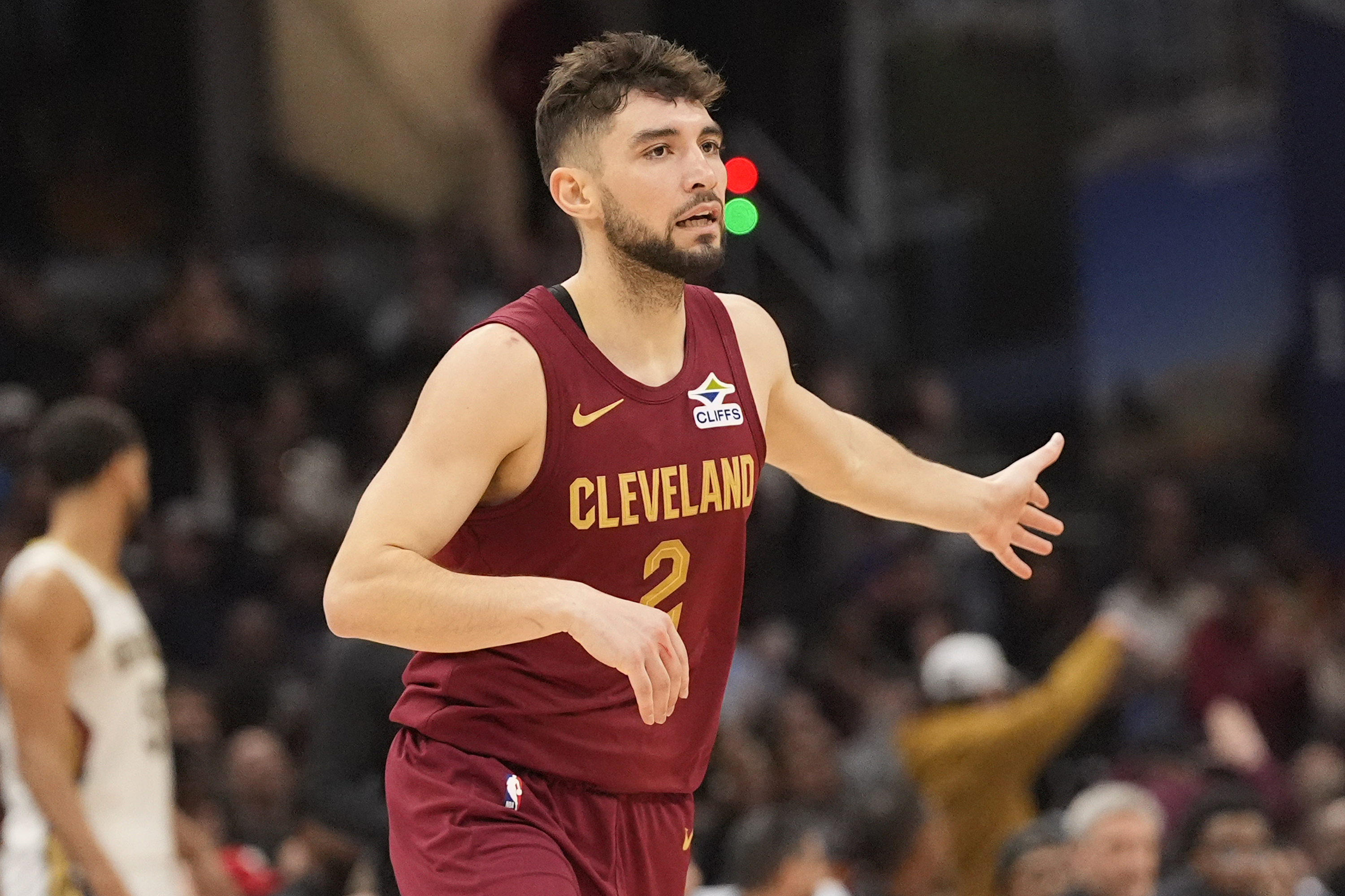 Cleveland Cavaliers guard Ty Jerome (2) gestures after a three-point basket in the first half of an NBA basketball game against the New Orleans Pelicans, Wednesday, Nov. 20, 2024, in Cleveland.