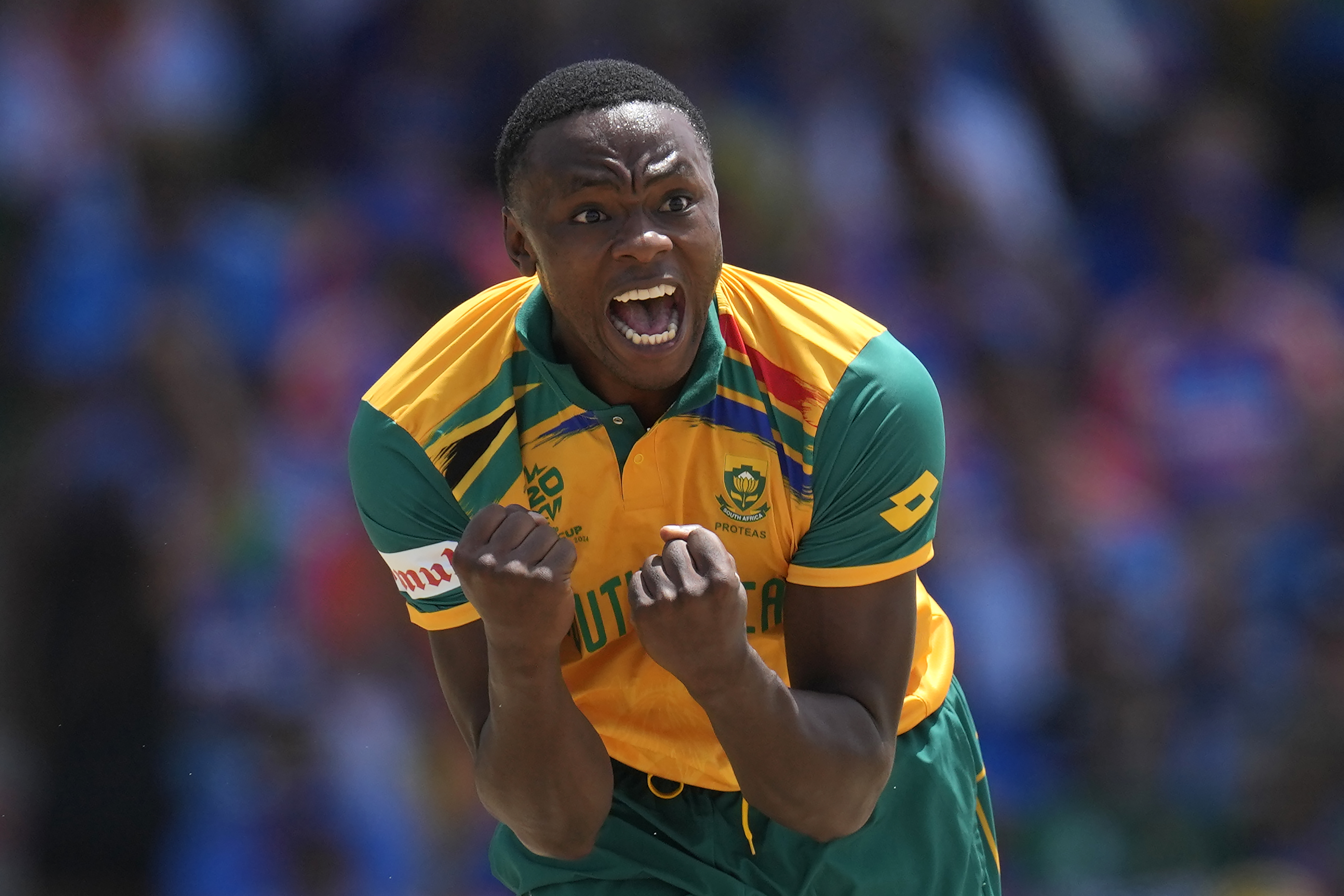 FILE - South Africa's Kagiso Rabada celebrates the dismissal of India's Suryakumar Yadav during the ICC Men's T20 World Cup final cricket match between India and South Africa at Kensington Oval in Bridgetown, Barbados, on June 29, 2024.
