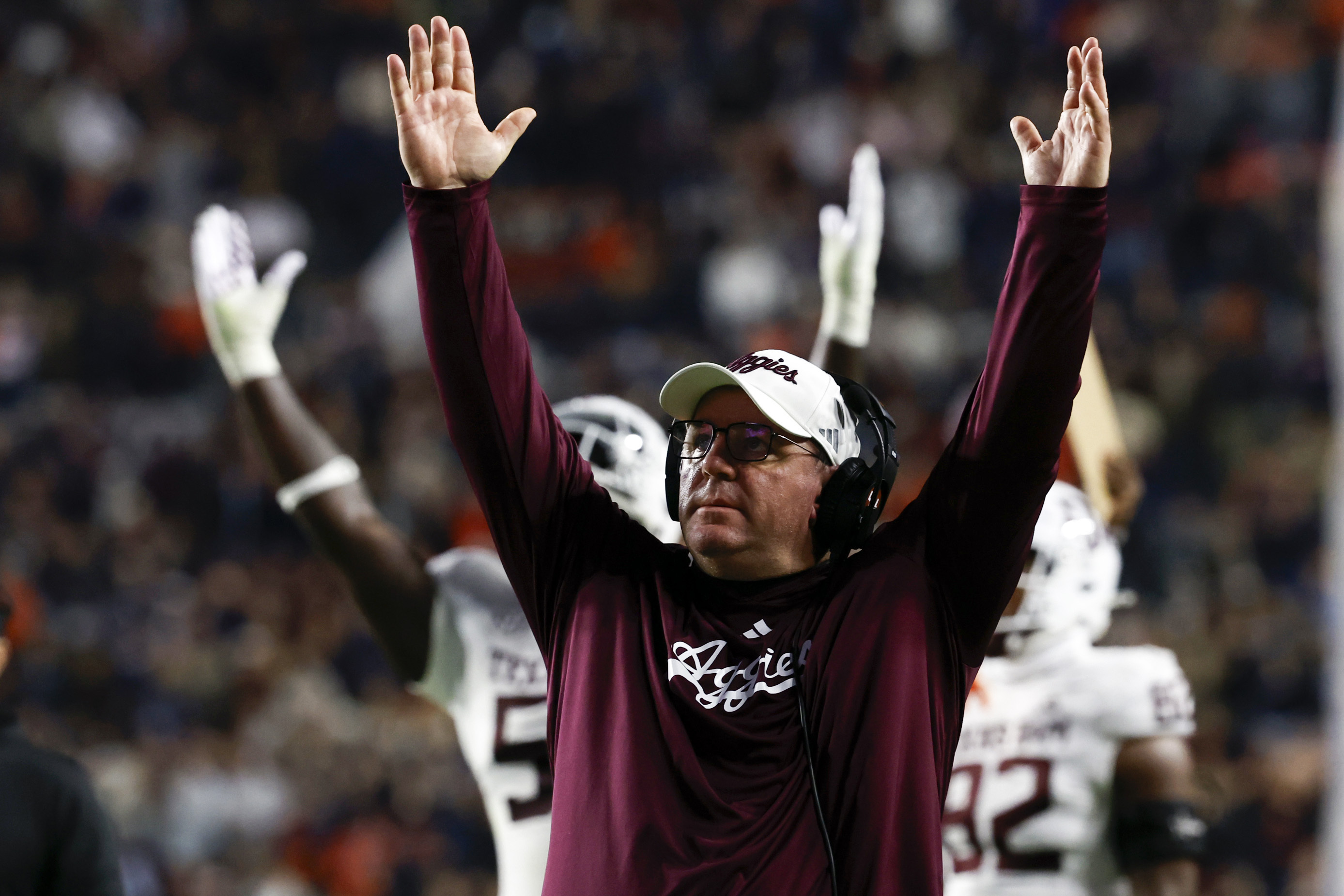 Texas A&M head coach Mike Elko reacts after a touchdown against Auburn during the first half of an NCAA college football game, Saturday, Nov. 23, 2024, in Auburn, Ala.