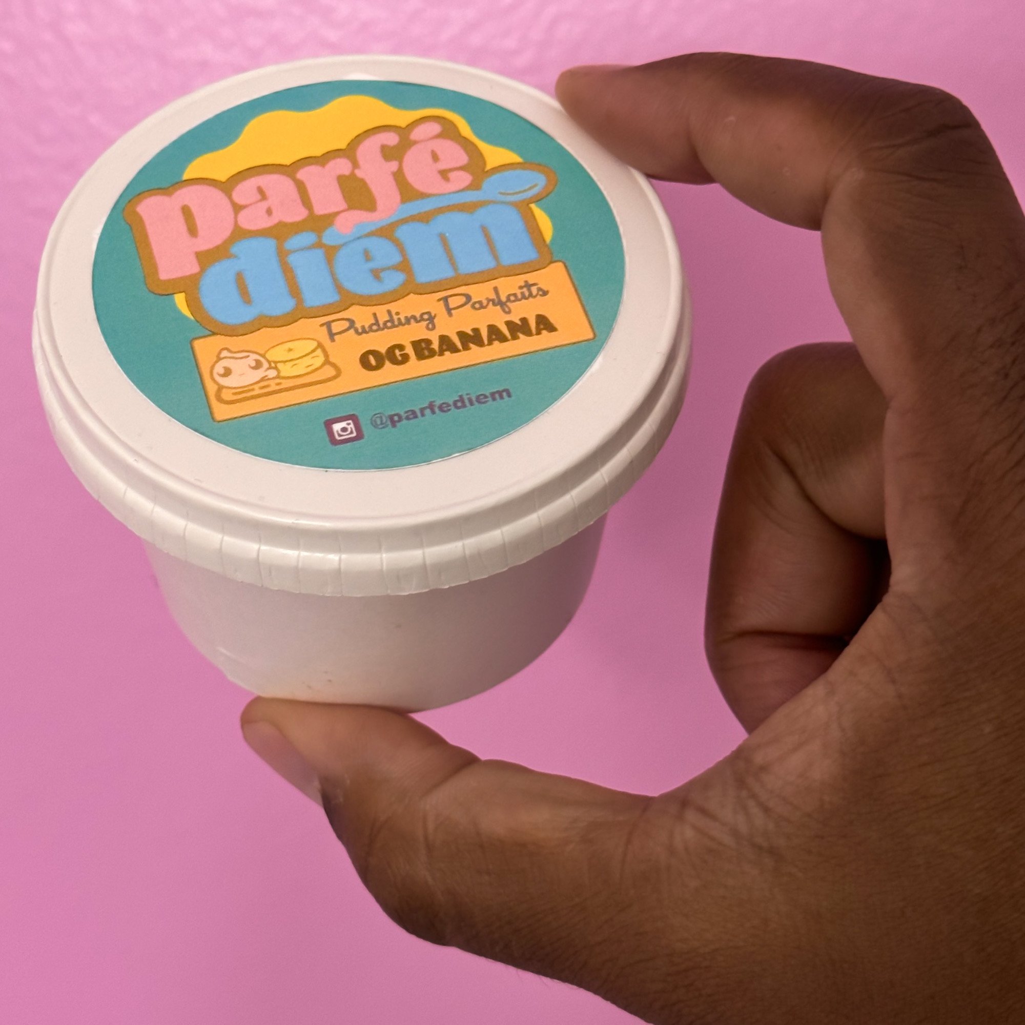 Parker Barbee holds a container of pudding parfaits that can be used for catering orders from his business Parfé Diem. Barbee recently won a $25,000 grant designated for Black-owned businesses to help grow his business.