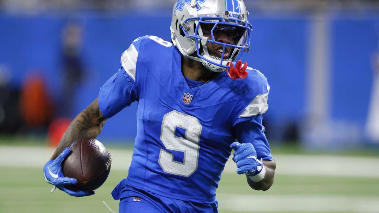 Detroit Lions wide receiver Jameson Williams (9) catches a 64-yard touchdown pass against the Jacksonville Jaguars during the second half of an NFL football game, Sunday, Nov. 17, 2024, in Detroit.