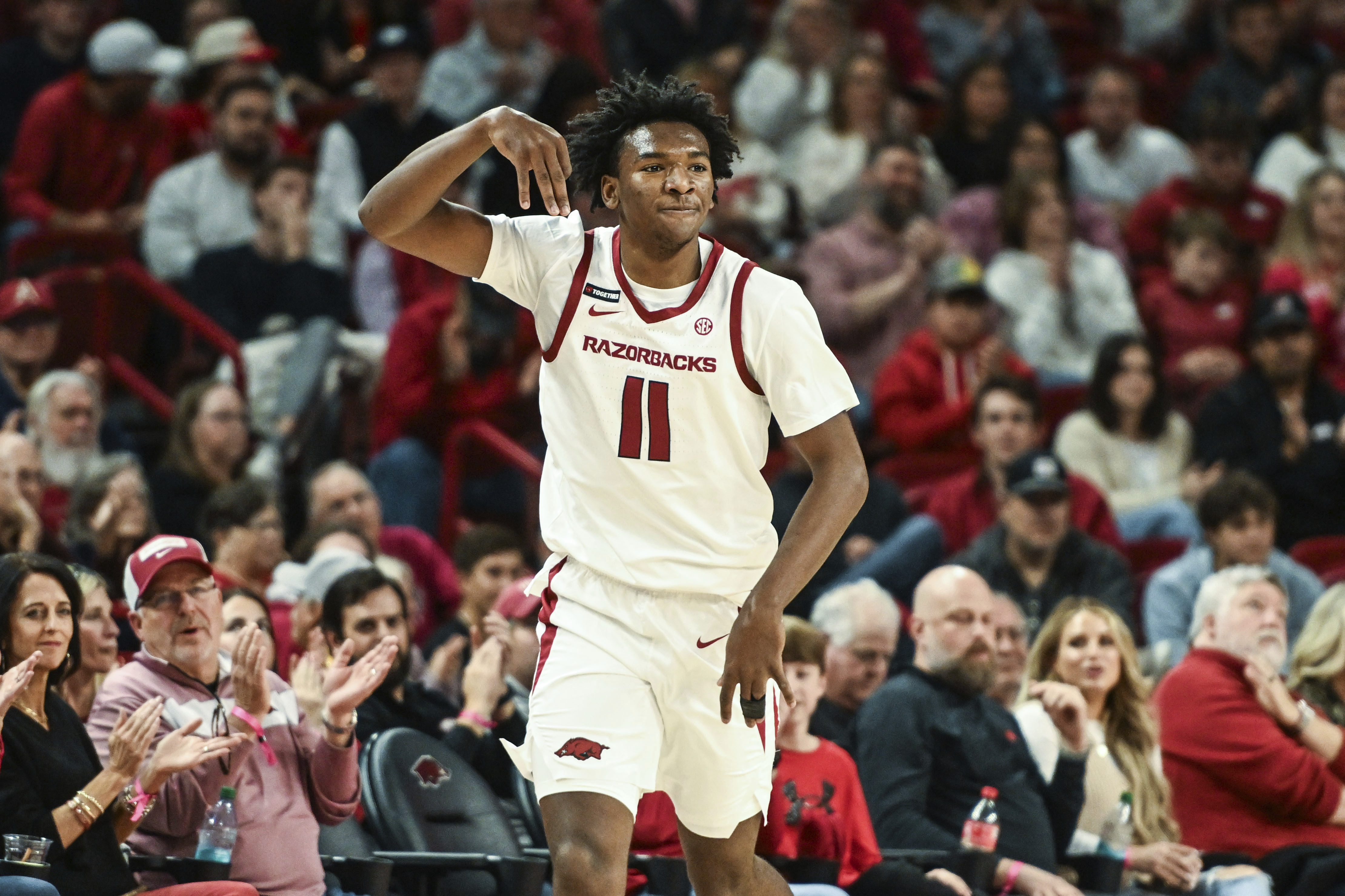 Arkansas forward Karter Knox (11) reacts after hitting a three point shot against Maryland Eastern Shore during the first half of an NCAA college basketball game Friday, Nov. 22, 2024, in Fayetteville, Ark. 