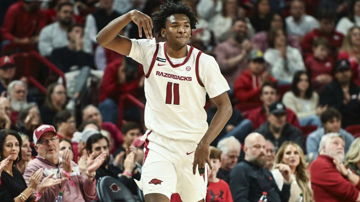 Arkansas forward Karter Knox (11) reacts after hitting a three point shot against Maryland Eastern Shore during the first half of an NCAA college basketball game Friday, Nov. 22, 2024, in Fayetteville, Ark.