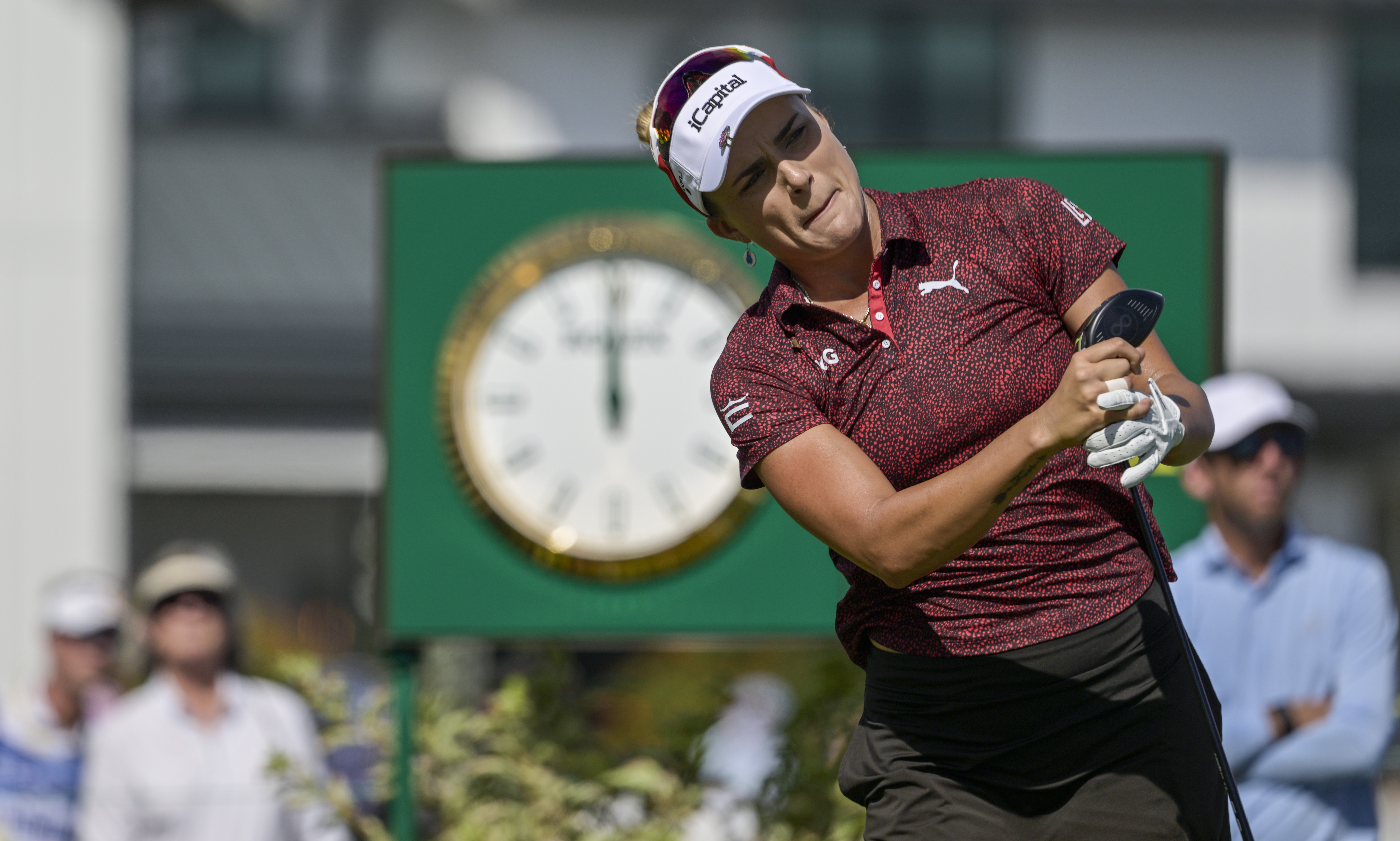 Lexi Thompson watches her tee shot on the 10th hole during the first round of the LPGA Annika golf tournament at Pelican Golf Club, Thursday, Nov. 14, 2024, in Belleair, Fla.