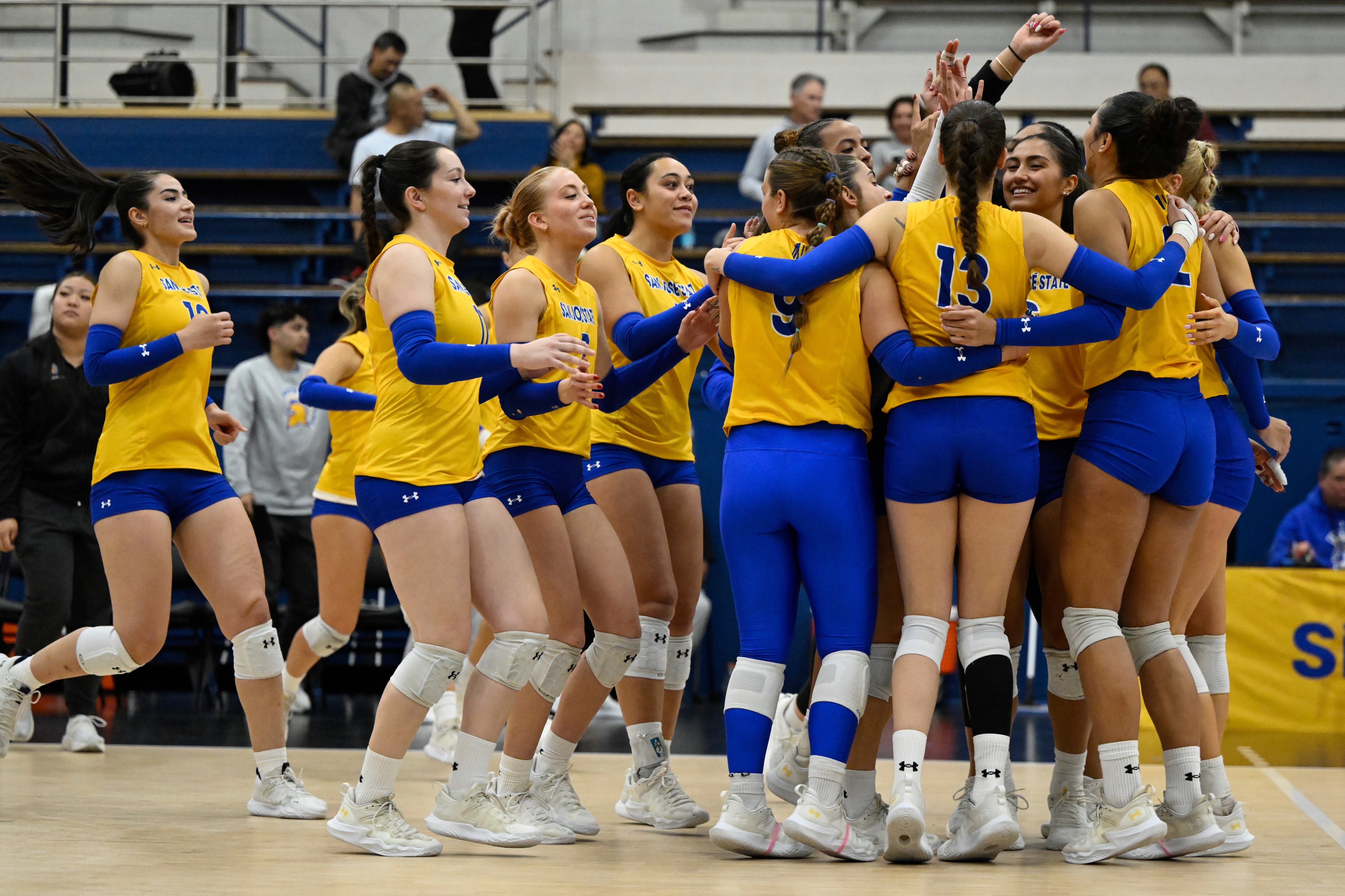 The San Jose State Spartans celebrate their win over the Air Force Falcons after an NCAA college volleyball match Oct. 31, in San Jose, Calif. Utah House Speaker Mike Schultz voiced his opinion of a ruling allowing a San Jose State transgender athlete to compete in this week's women's volleyball tournament.