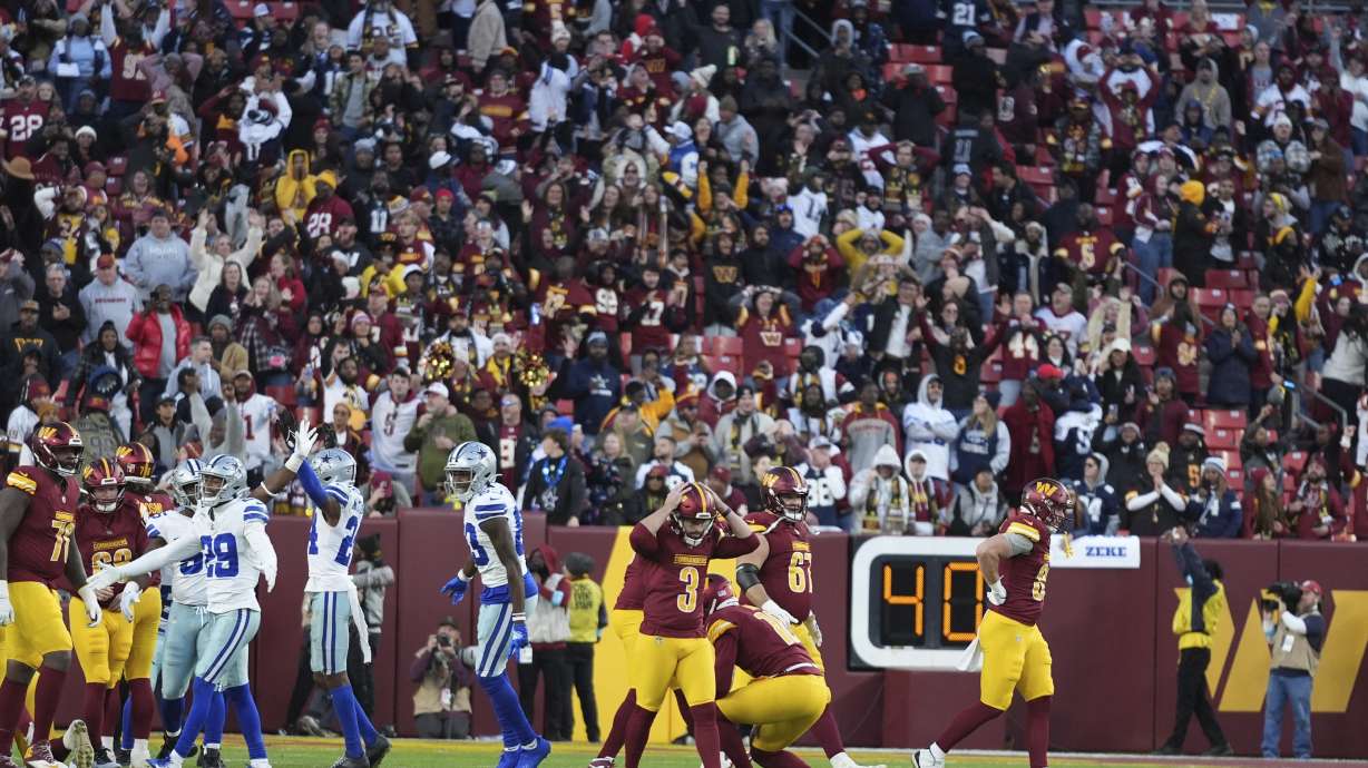 Washington Commanders place kicker Austin Seibert (3) reacts after an unsuccessful point after attempt during the second half of an NFL football game against the Dallas Cowboys, Sunday, Nov. 24, 2024, in Landover, Md.