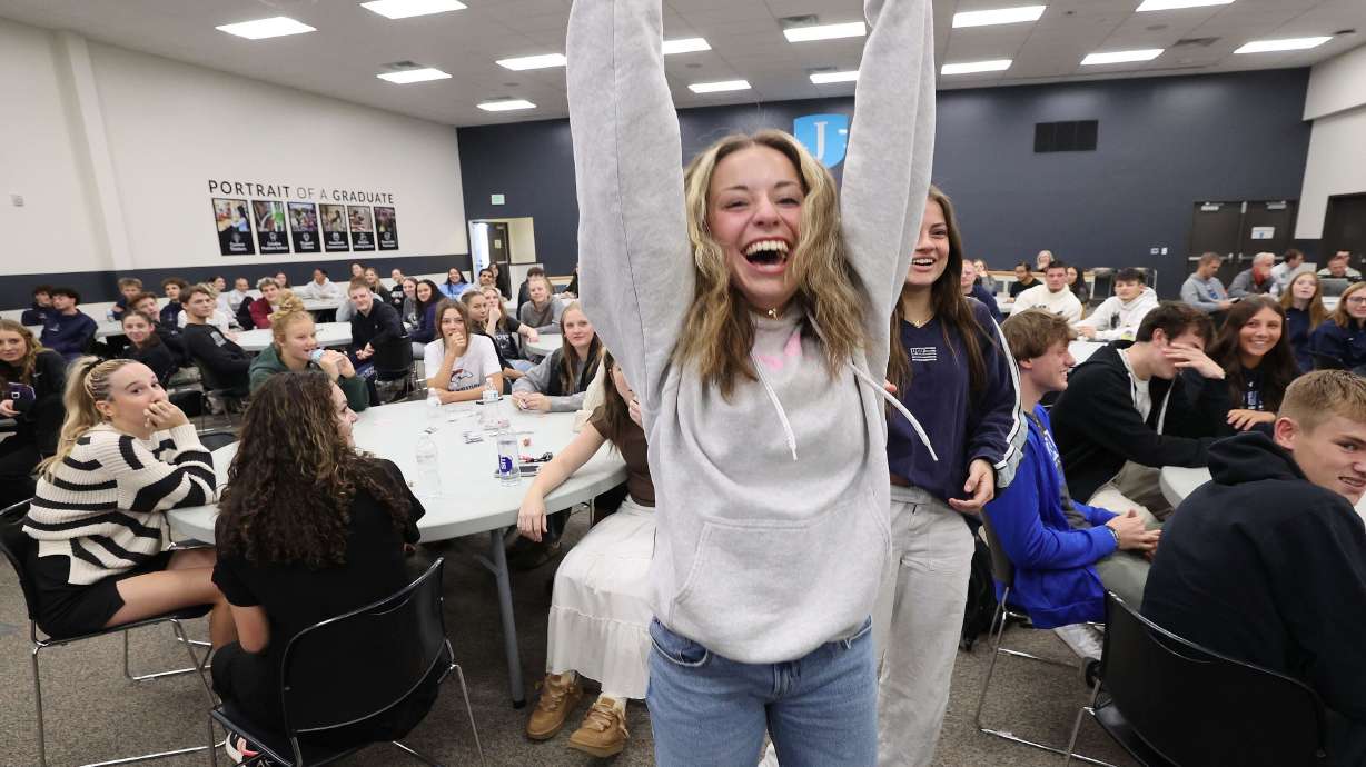 Jayedyn White, a West Jordan High School student, celebrates winning the Rock, Paper, Scissors competition as varsity sports captains from Jordan District high schools gather for a district-sponsored workshop on Nov. 19.