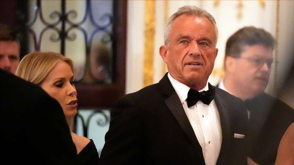 Robert F. Kennedy Jr. and his wife Cheryl Hines arrive before President-elect Donald Trump speaks during an America First Policy Institute gala at his Mar-a-Lago estate, Nov. 14, in Palm Beach, Fla.