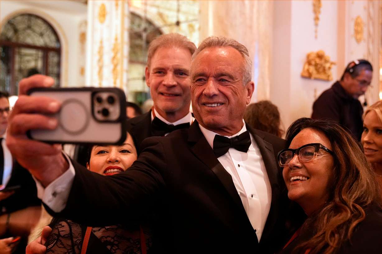 Robert F. Kennedy Jr. arrives before President-elect Donald Trump speaks during an America First Policy Institute gala at his Mar-a-Lago estate, Nov. 14, in Palm Beach, Fla.