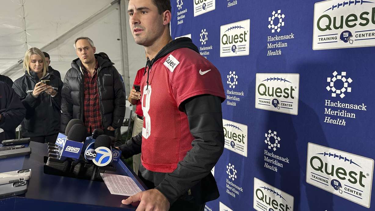 FILE - New York Giants NFL football quarterback Daniel Jones speaks to the media Nov. 21, 2024, in East Rutherford, N.J.