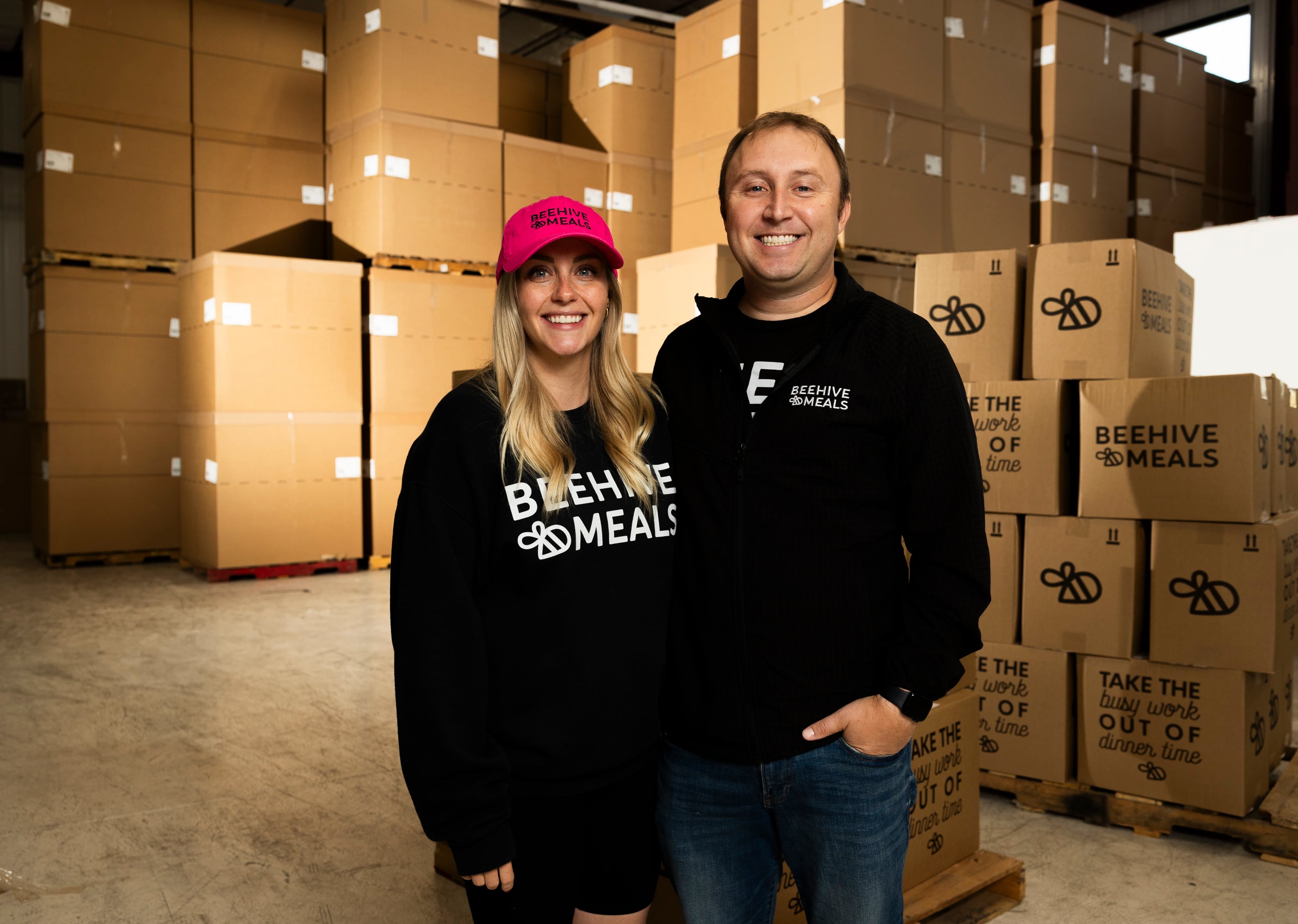 Allyse and Adam Jackson, owners of Beehive Meals, pose for a portrait in Beehive Meals warehouse in Layton on Oct. 21. The Jacksons’ business was just named one of America's top 100 small businesses by the U.S. Chamber of Commerce.