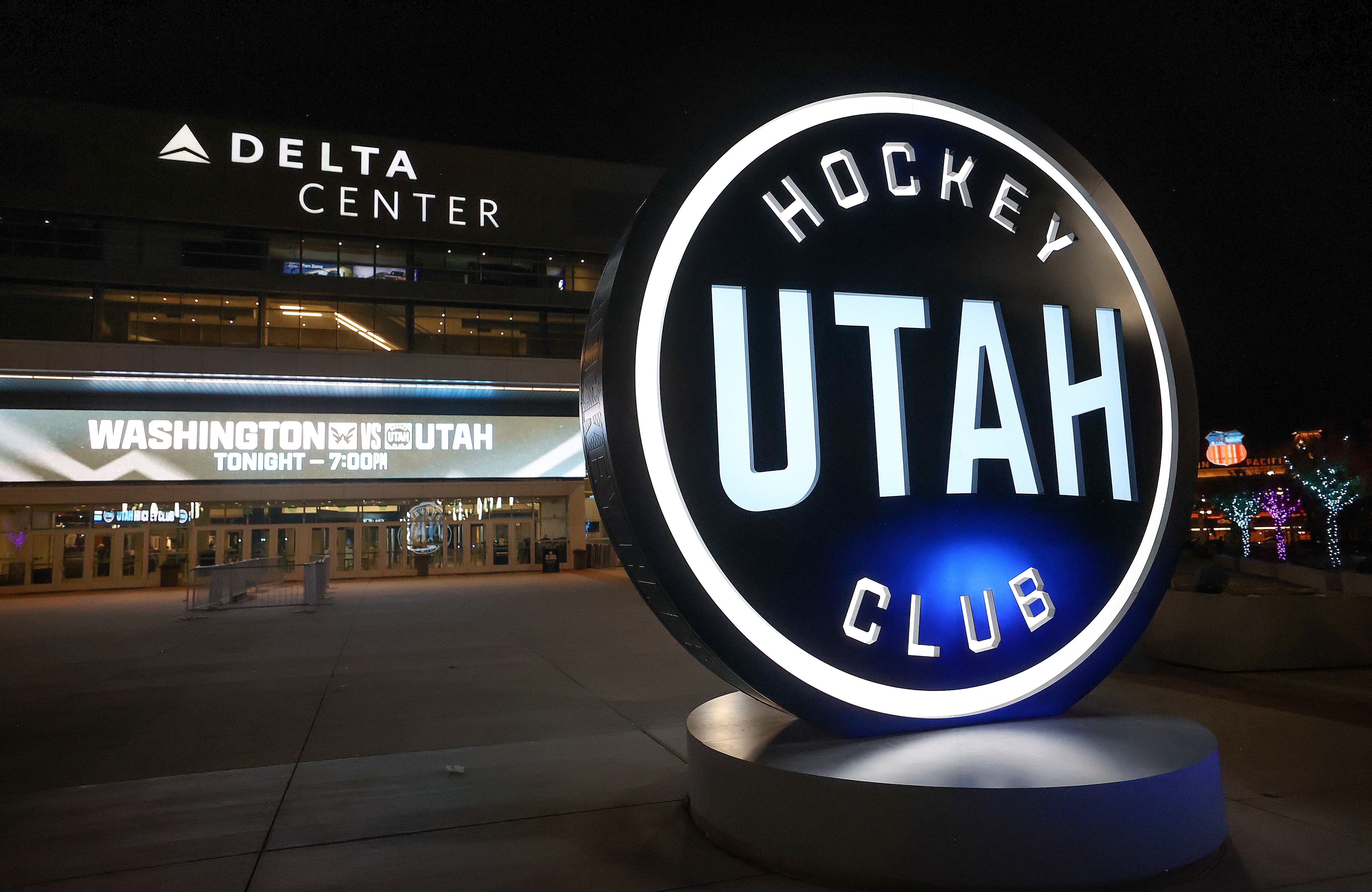 The Utah Hockey Club sign is lit up outside of the Delta Center in Salt Lake City on Nov. 18.