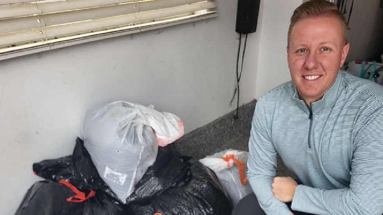 Jay Tobey, founder and CEO of North Star Financial Group and North Star Recovery and Wellness, poses with bags of donated clothing. North Star is kicking off a holiday clothing drive this year.