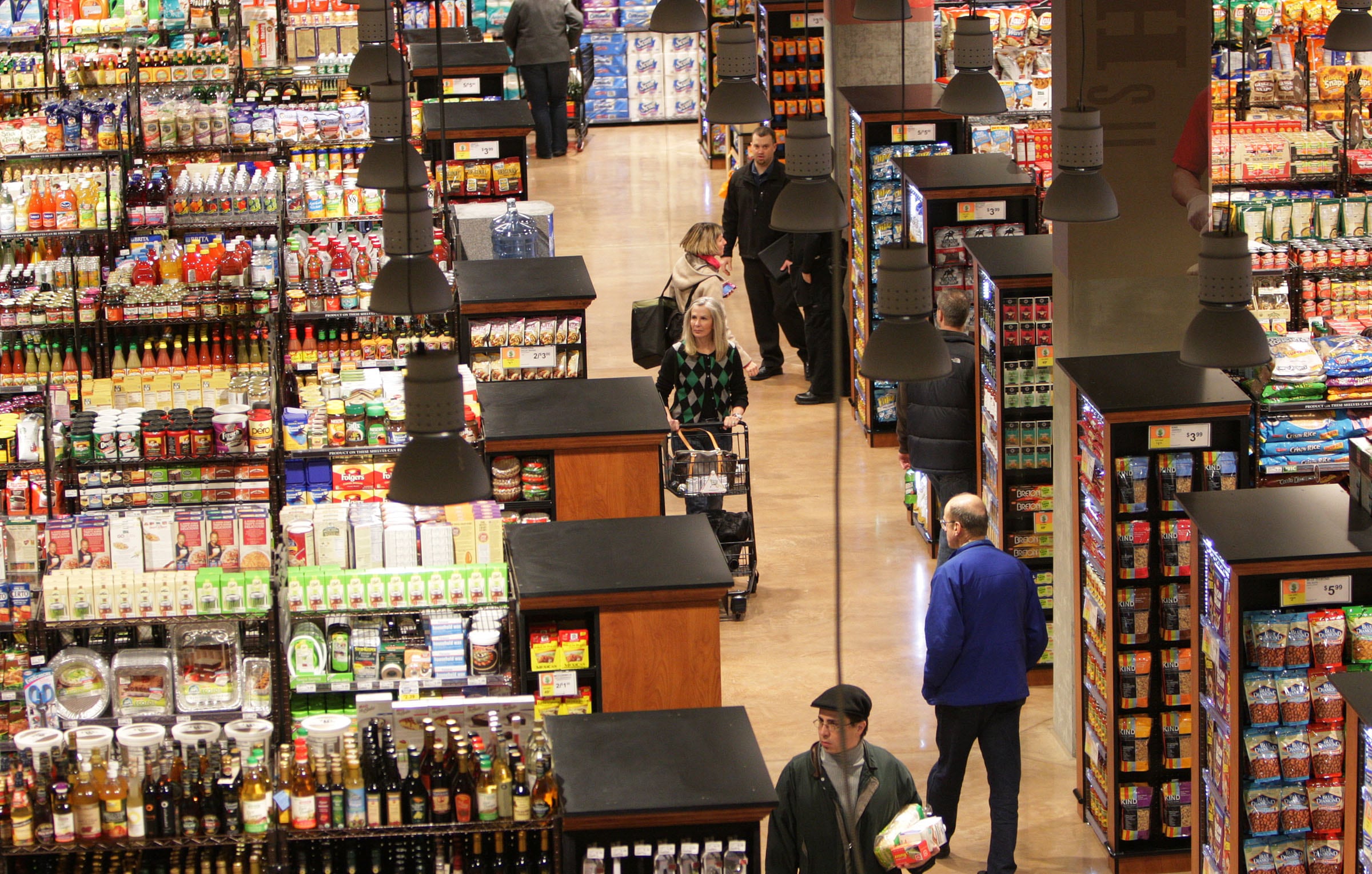 Grocery shoppers shop at the new City Creek Harmons store in downtown Salt Lake City, Feb. 15, 2012. Utah state Sen. Lincoln Fillmore plans to propose a law to say a restaurant tax must be added to sales made in “portions of a grocery store that function like a restaurant."