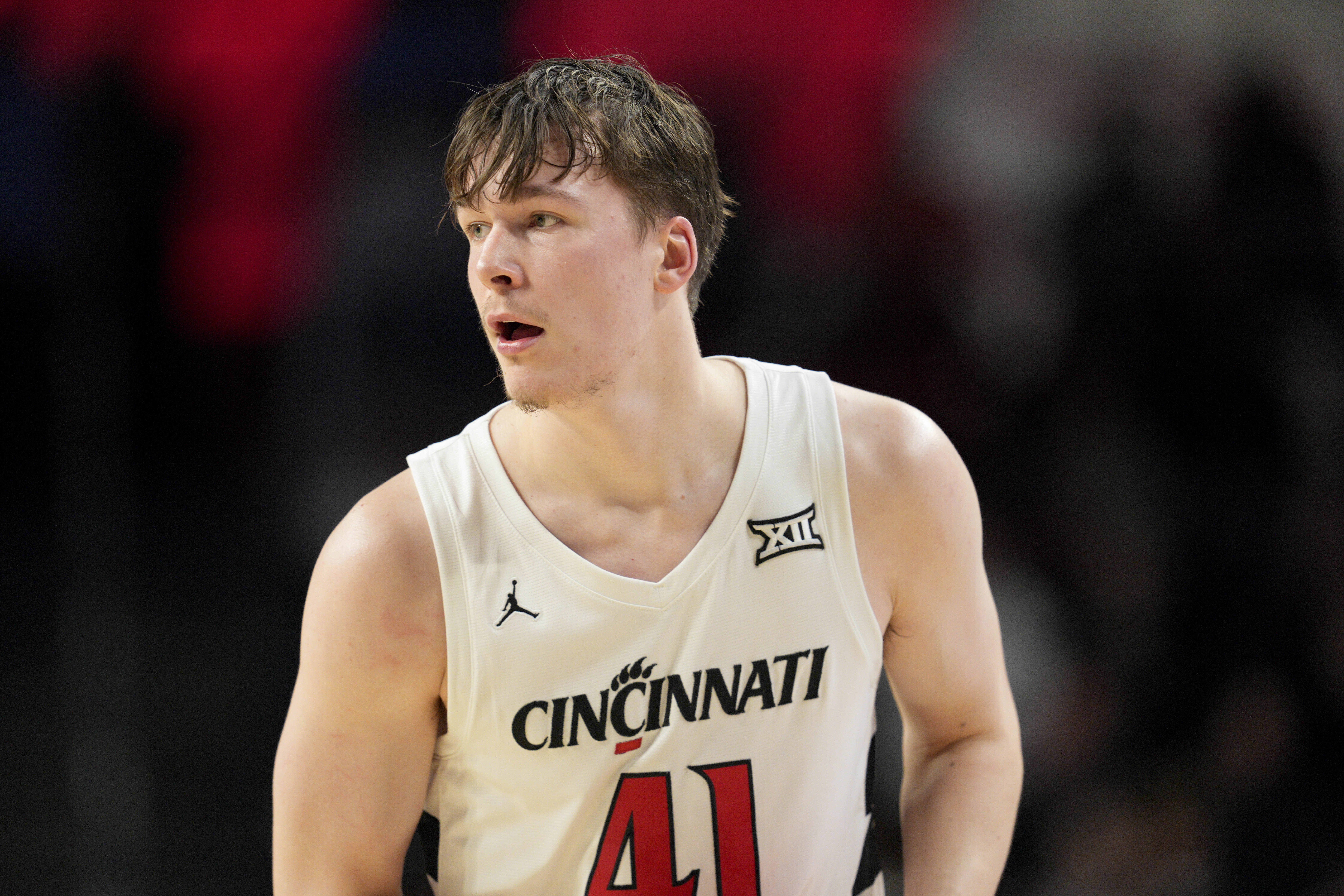 Cincinnati guard Simas Lukosius controls the ball during the first half of an NCAA college basketball game against Alabama State, Wednesday, Nov. 27, 2024, in Cincinnati.