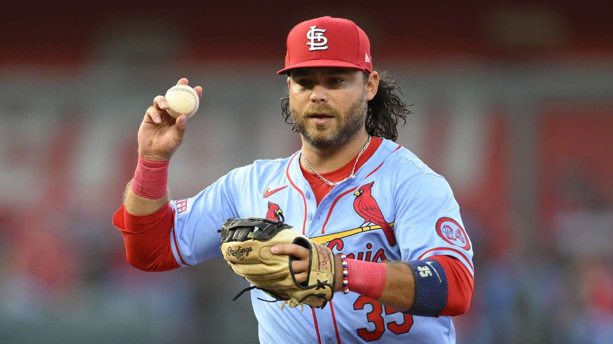 FILE - St. Louis Cardinals shortstop Brandon Crawford works a rundown of Kansas City Royals' Bobby Witt Jr. during the fifth inning of a baseball game, Aug. 10, 2024, in Kansas City, Mo.
