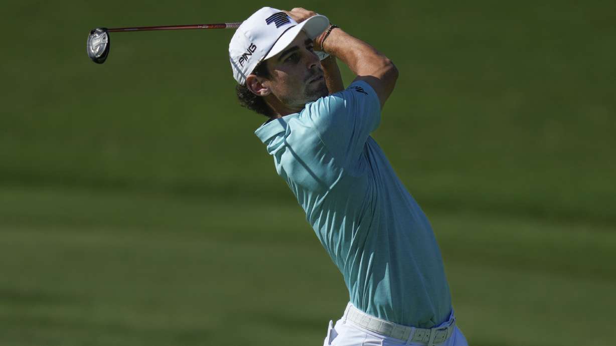 Joaquin Niemann of Chile plays a second shot on the 7th hole during the second round of World Tour Golf Championship in Dubai, United Arab Emirates, Saturday, Nov. 16, 2024.