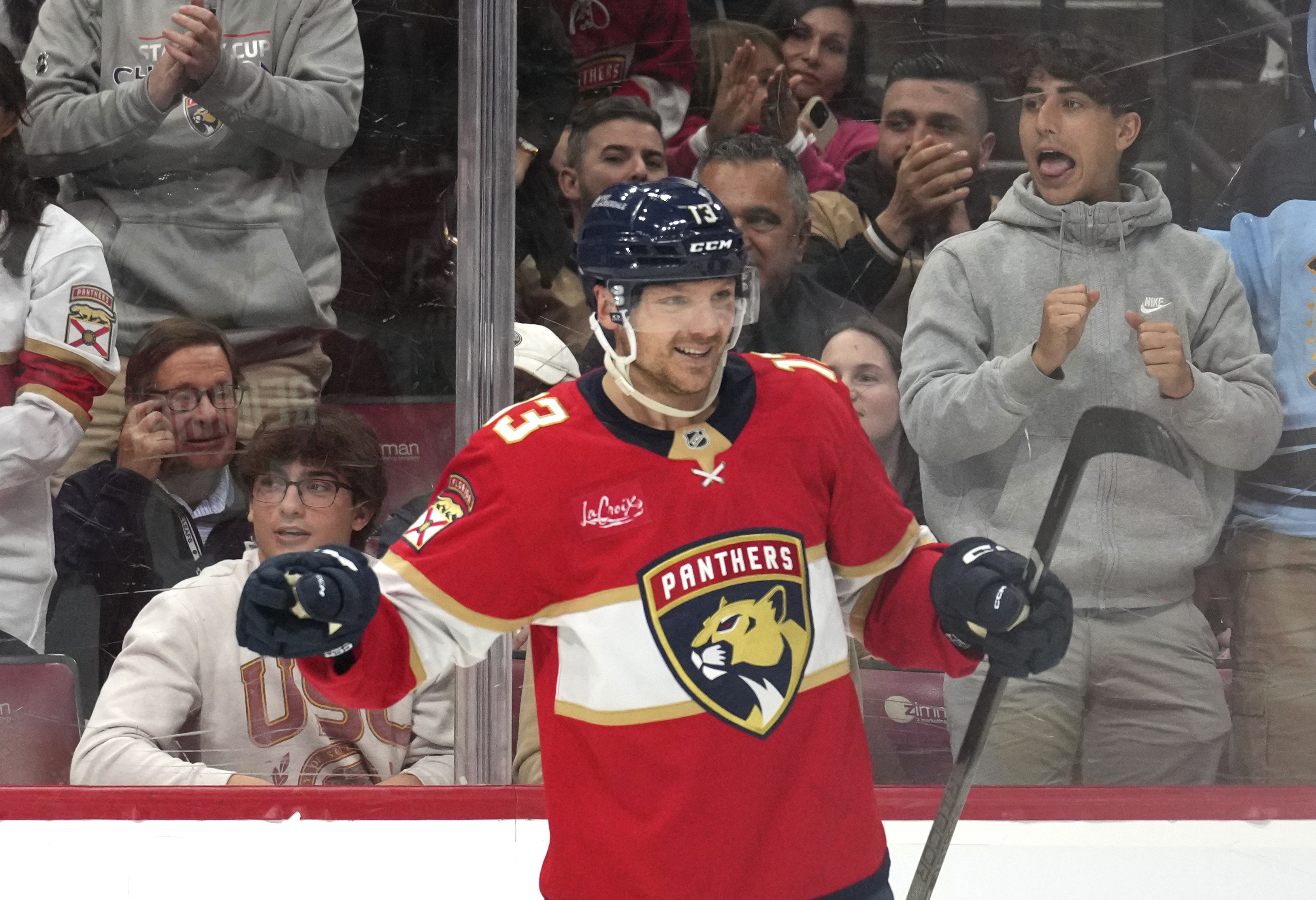 Florida Panthers center Sam Reinhart (13) reacts after scoring a goal during the second period of an NHL hockey game against the Toronto Maple Leafs, Wednesday, Nov. 27, 2024, in Sunrise, Fla. 
