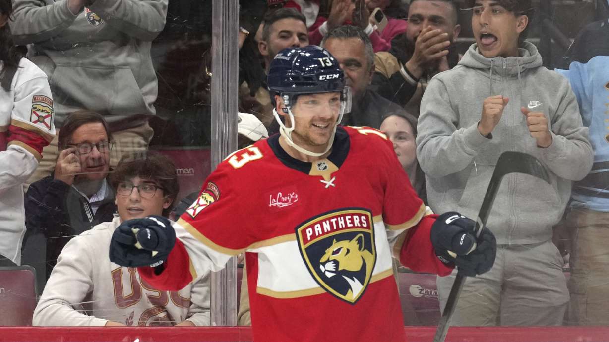 Florida Panthers center Sam Reinhart (13) reacts after scoring a goal during the second period of an NHL hockey game against the Toronto Maple Leafs, Wednesday, Nov. 27, 2024, in Sunrise, Fla.