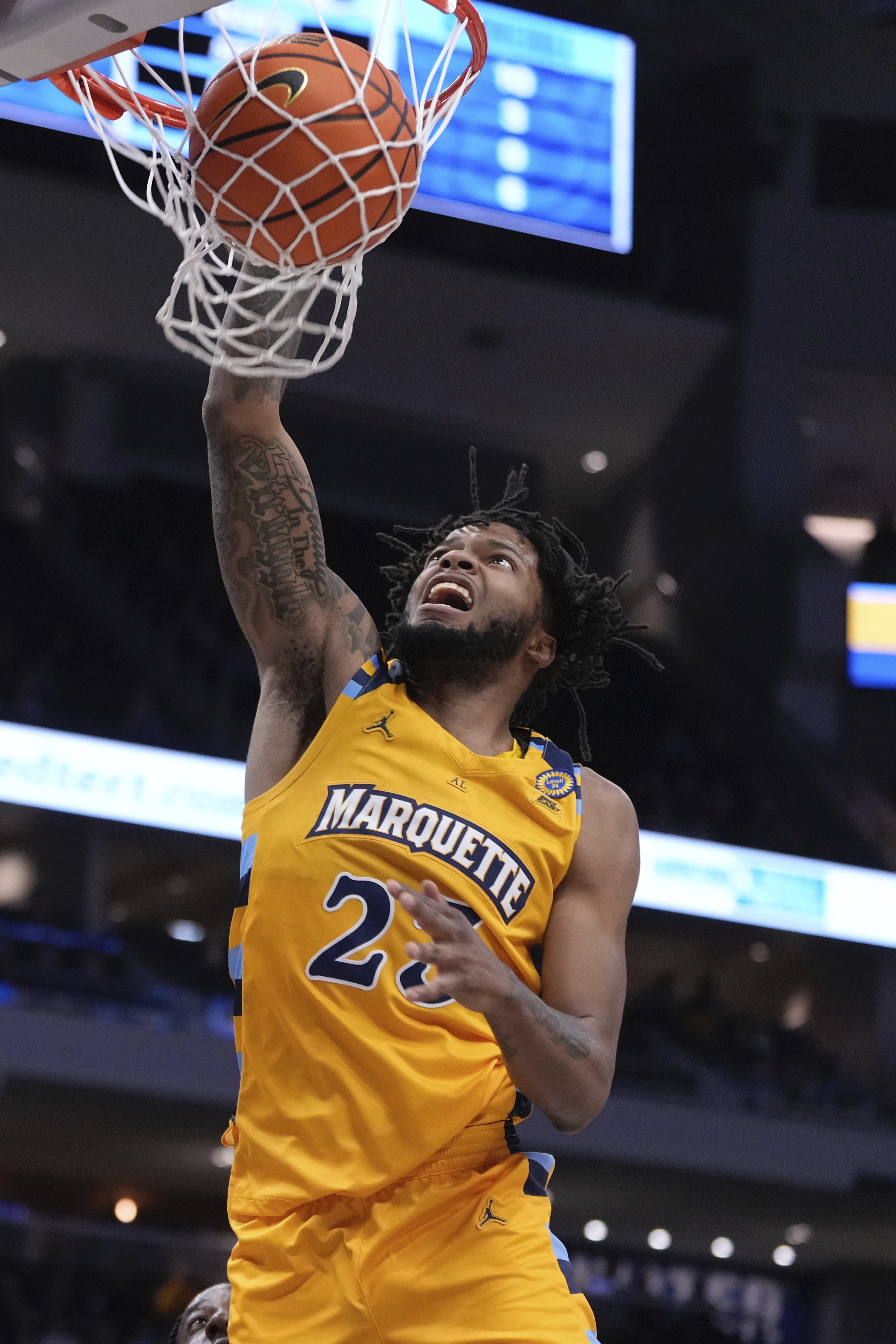 Marquette's David Joplin dunks during the first half of an NCAA college basketball game Wednesday, Nov. 27, 2024, in Milwaukee.
