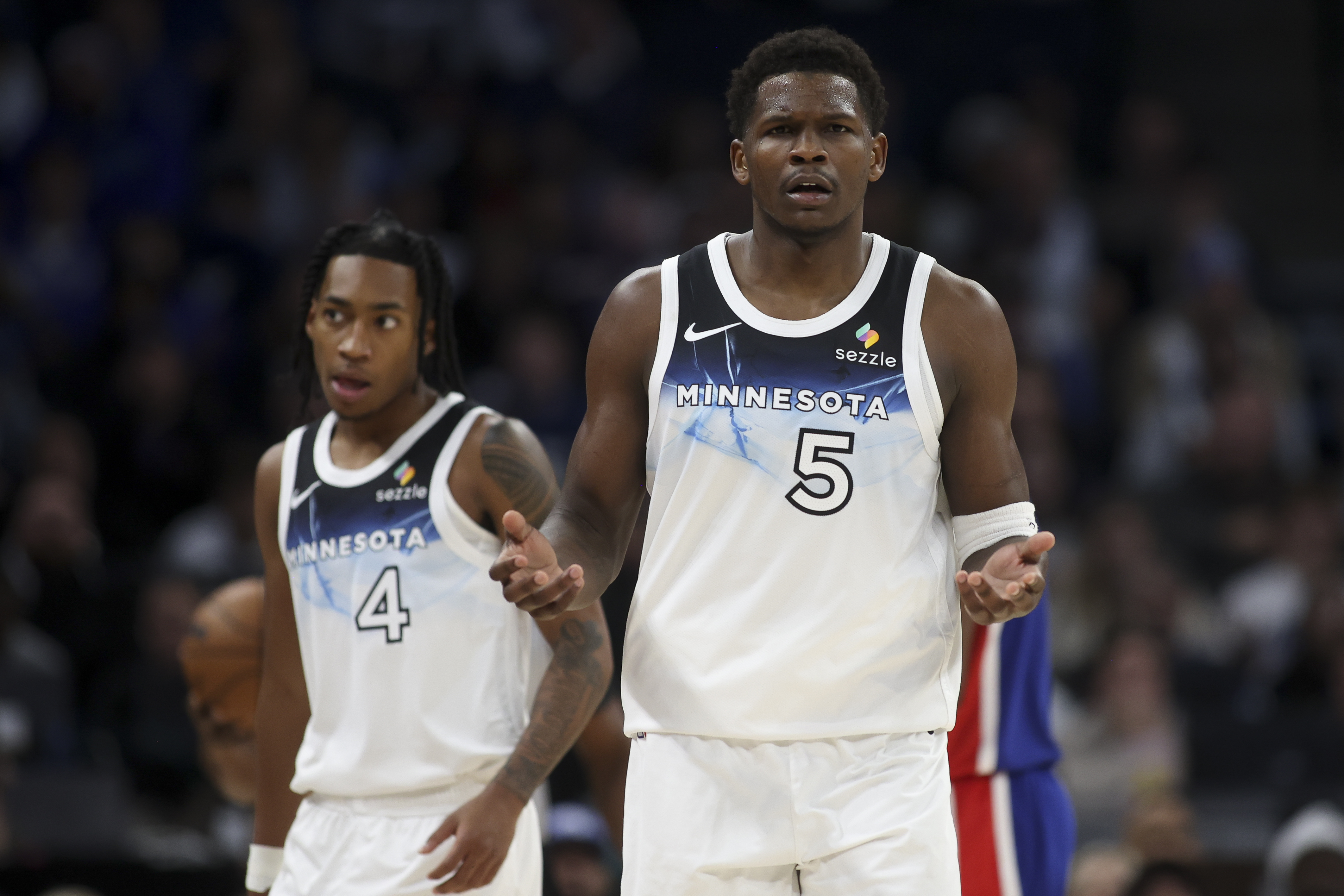 Minnesota Timberwolves guard Anthony Edwards (5) reacts to an official's call during the first half of an NBA basketball game against the Sacramento Kings, Wednesday, Nov. 27, 2024, in Minneapolis.