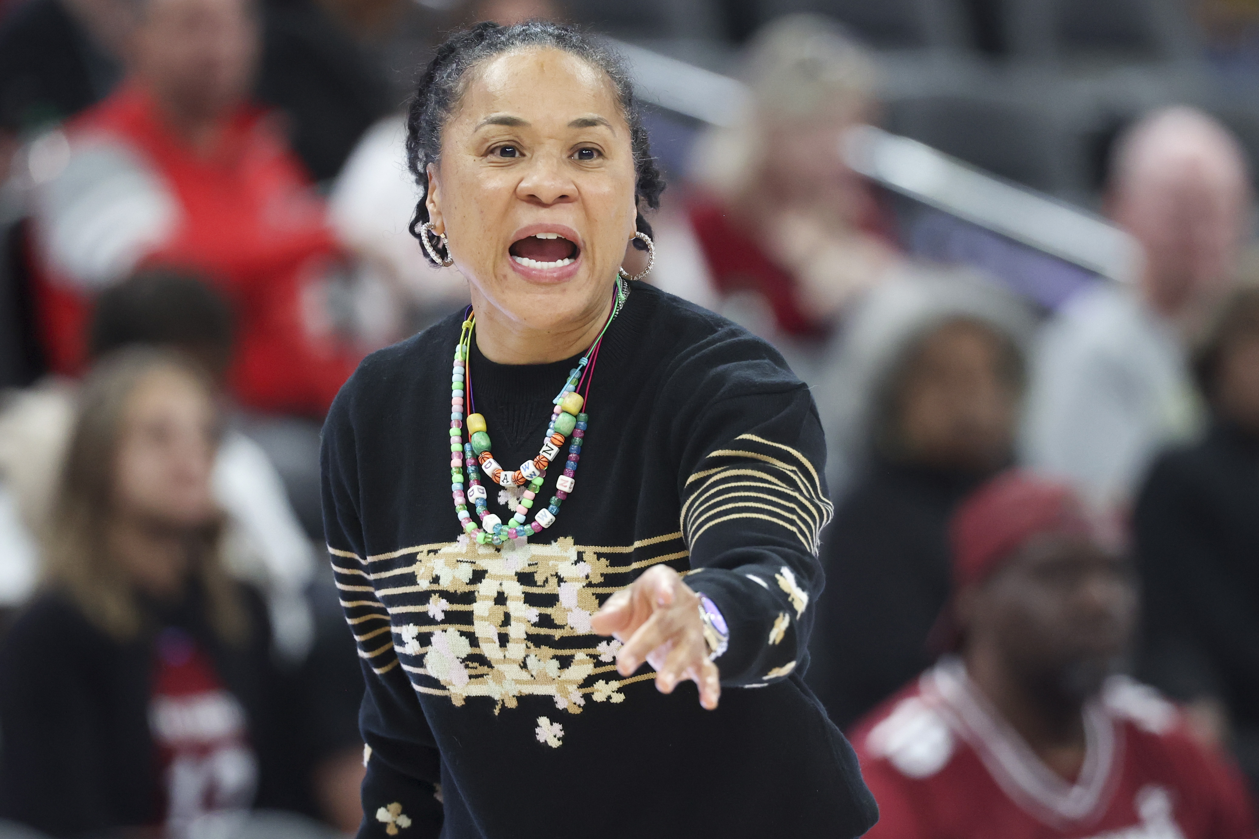 South Carolina head coach Dawn Staley yells to her team during the second half of an NCAA basketball game against Michigan Monday, Nov. 4, 2024, in Las Vegas. 