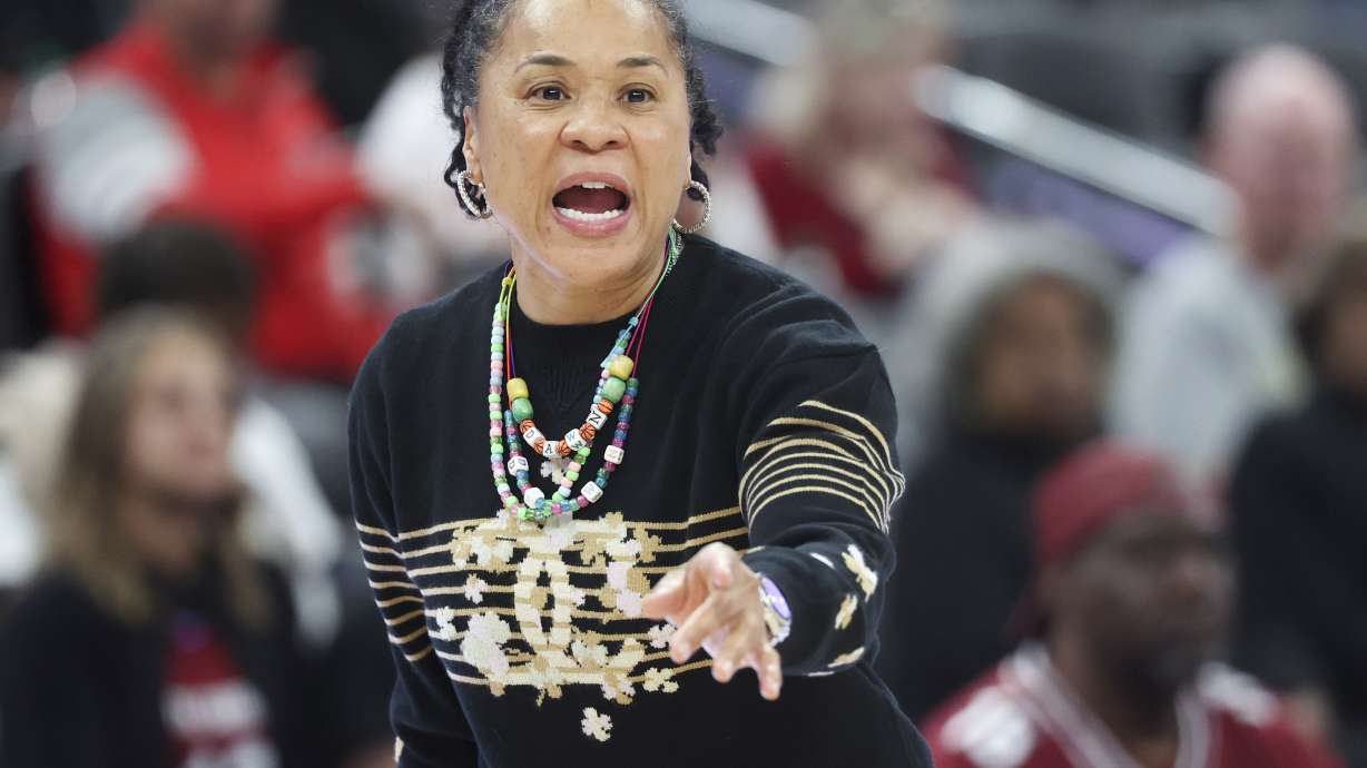 South Carolina head coach Dawn Staley yells to her team during the second half of an NCAA basketball game against Michigan Monday, Nov. 4, 2024, in Las Vegas.