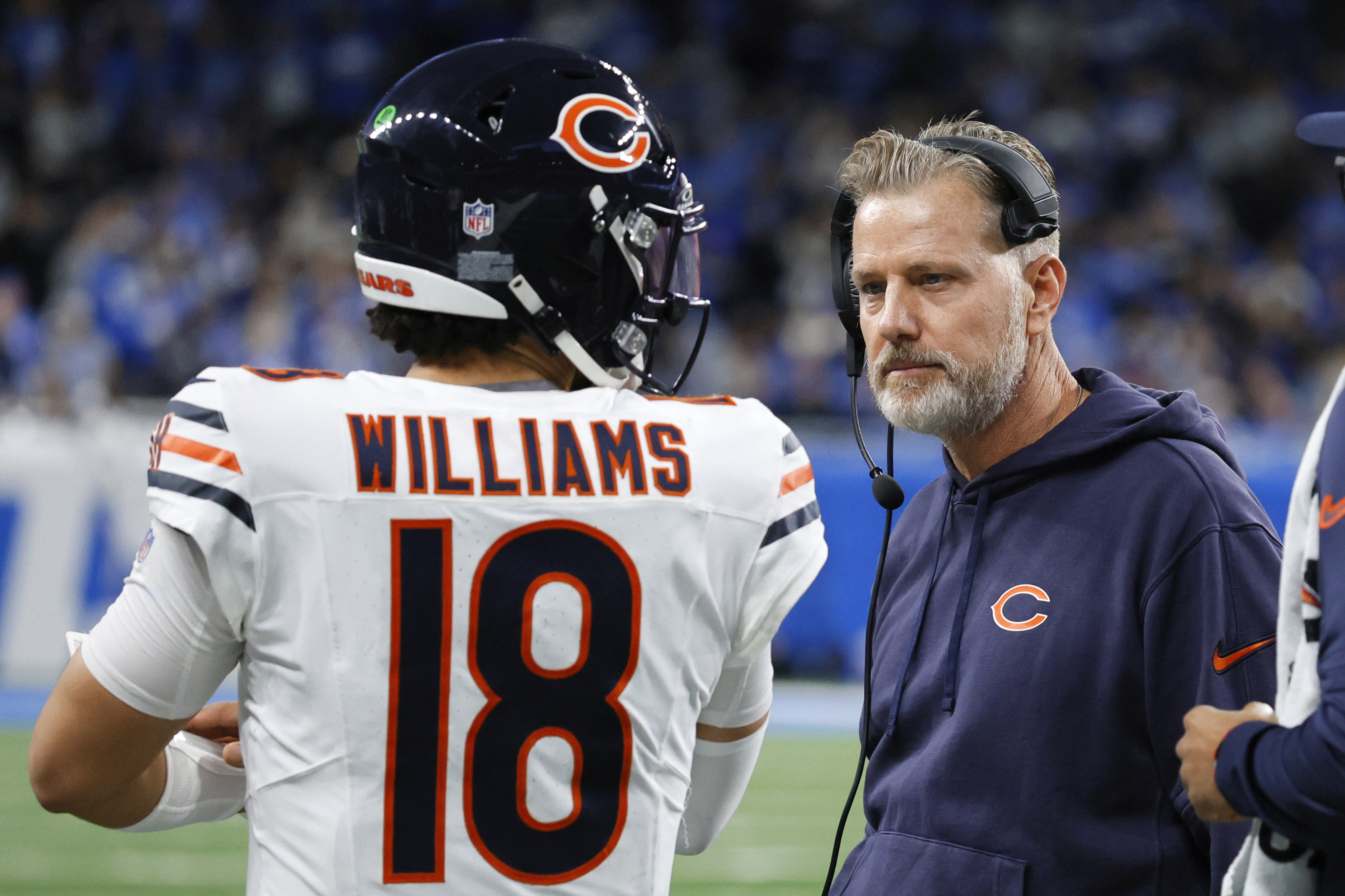 Chicago Bears quarterback Caleb Williams (18) talks with head coach Matt Eberflus during the second half of an NFL football game in Detroit, Thursday, Nov. 28, 2024. 