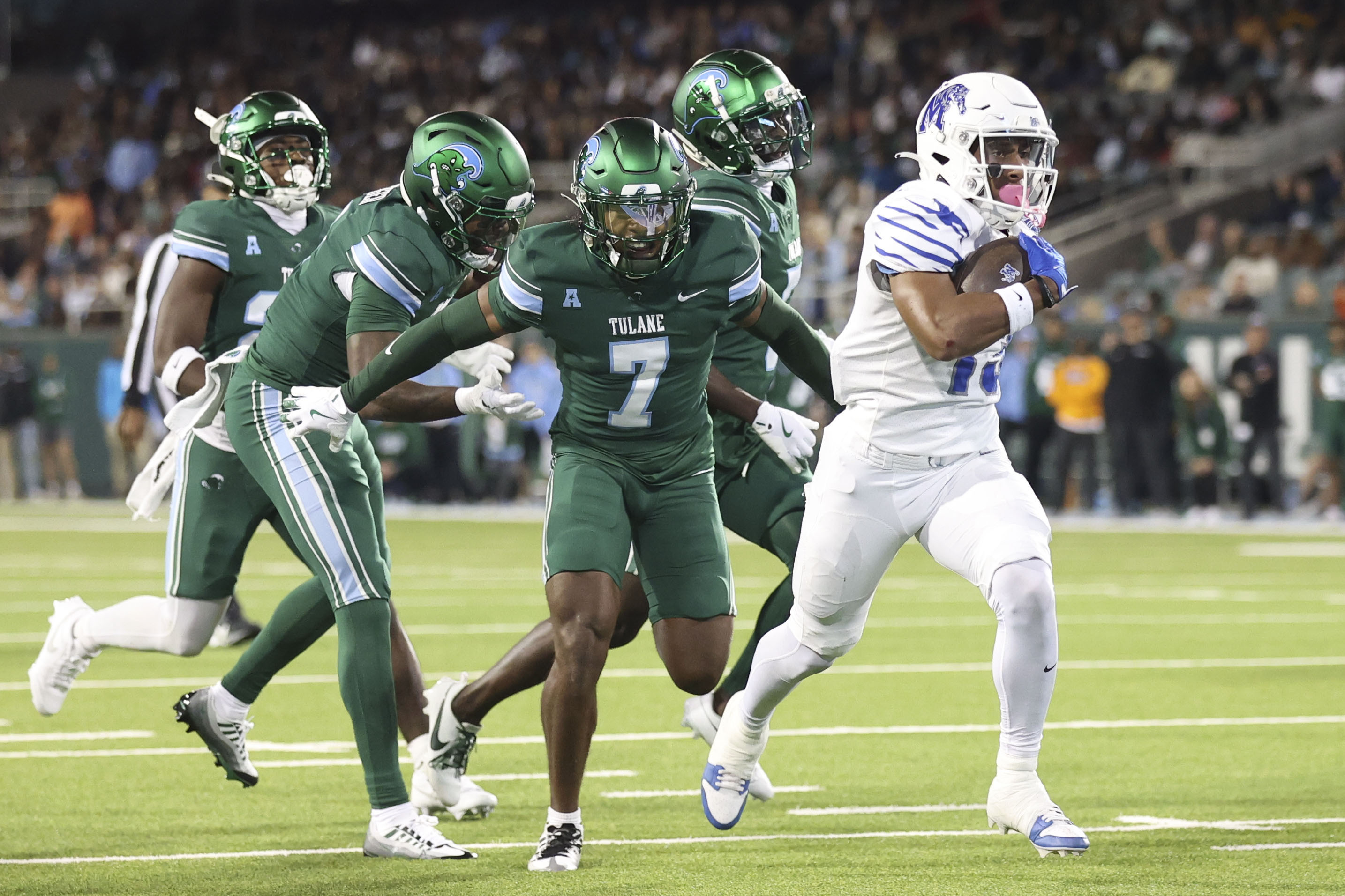 Desrosiers scores 3 TDs as Memphis tops No. 18 Tulane 34-24 to end the Green Wave's faint CFP hopes