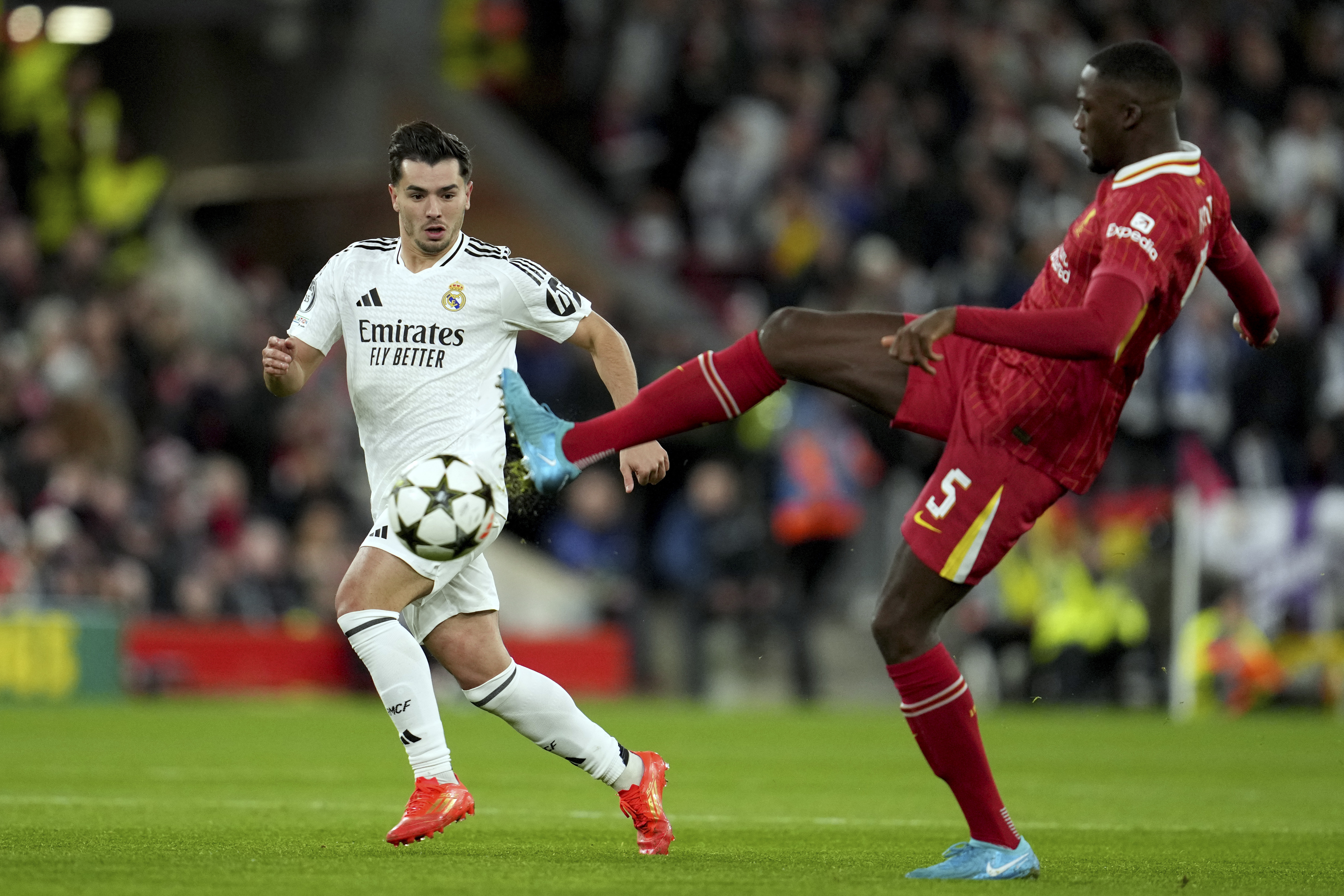 Real Madrid's Brahim Diaz vies for the ball with Liverpool's Ibrahima Konate, right, during the Champions League opening phase soccer match between Liverpool and Real Madrid at Anfield Stadium, Liverpool, England, Wednesday, Nov. 27, 2024.