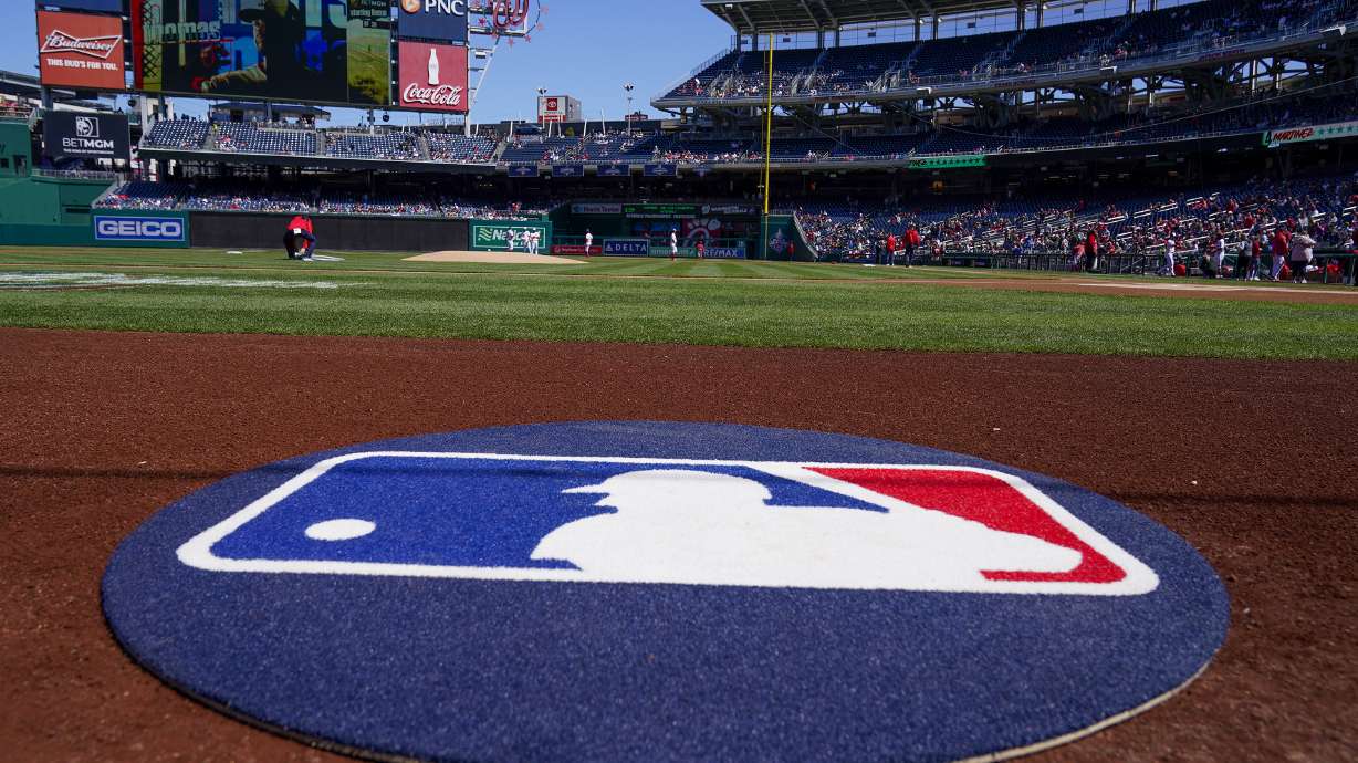 The on-deck circle with the MLB logo is in place before a baseball game between the Washington Nationals and the Atlanta Braves at Nationals Park, Sunday, April 2, 2023, in Washington.