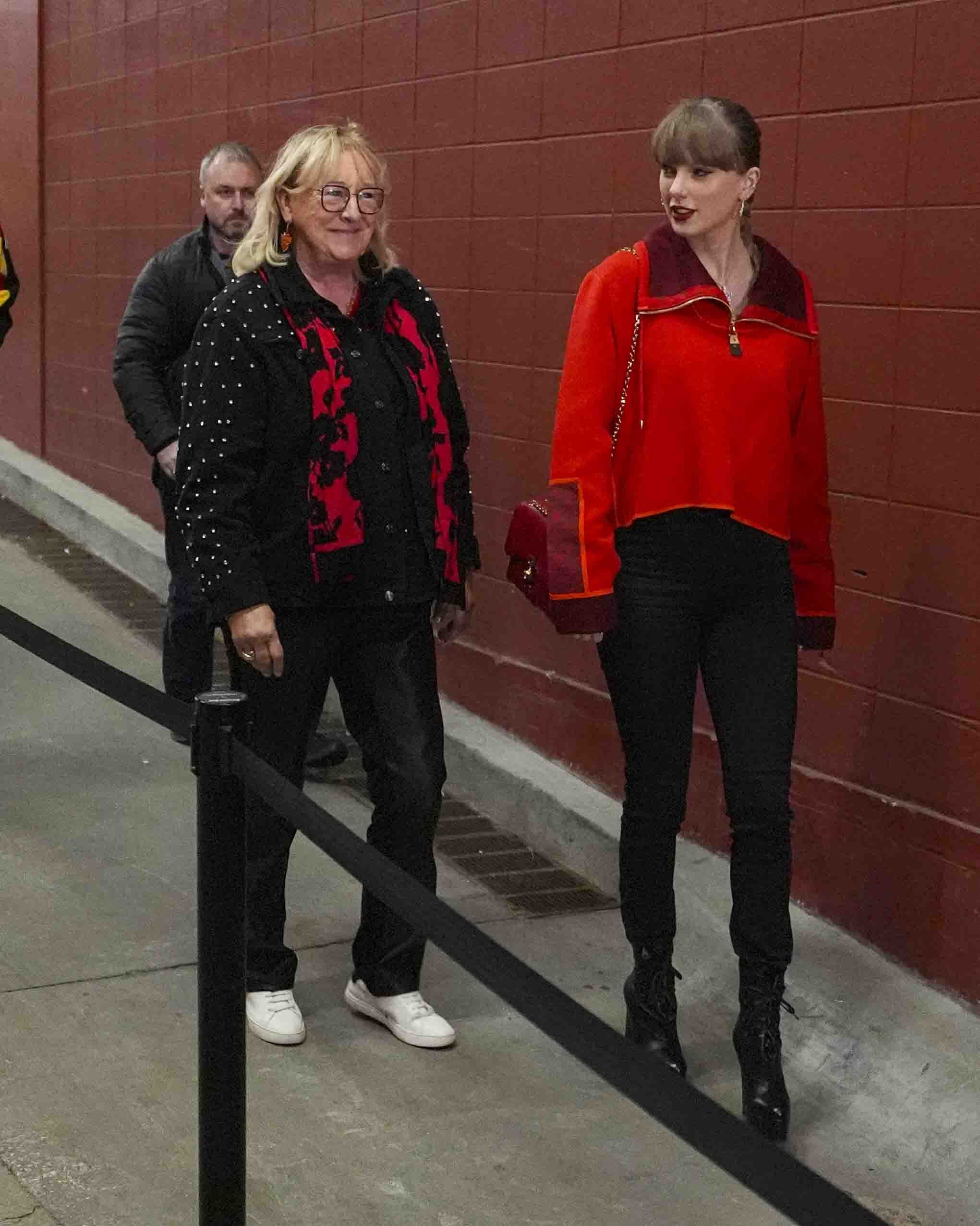 Singer Taylor Swift, right, and Donna Kelce arrive before the start of an NFL football game between the Las Vegas Raiders and the Kansas City Chiefs in Kansas City, Mo., Friday, Nov. 29, 2024. 