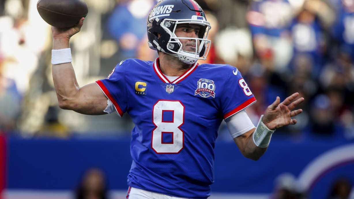 FILE - New York Giants quarterback Daniel Jones (8) passes the ball against the Washington Commanders during the third quarter of an NFL football game, Sunday, Nov. 3, 2024, in East Rutherford, N.J.