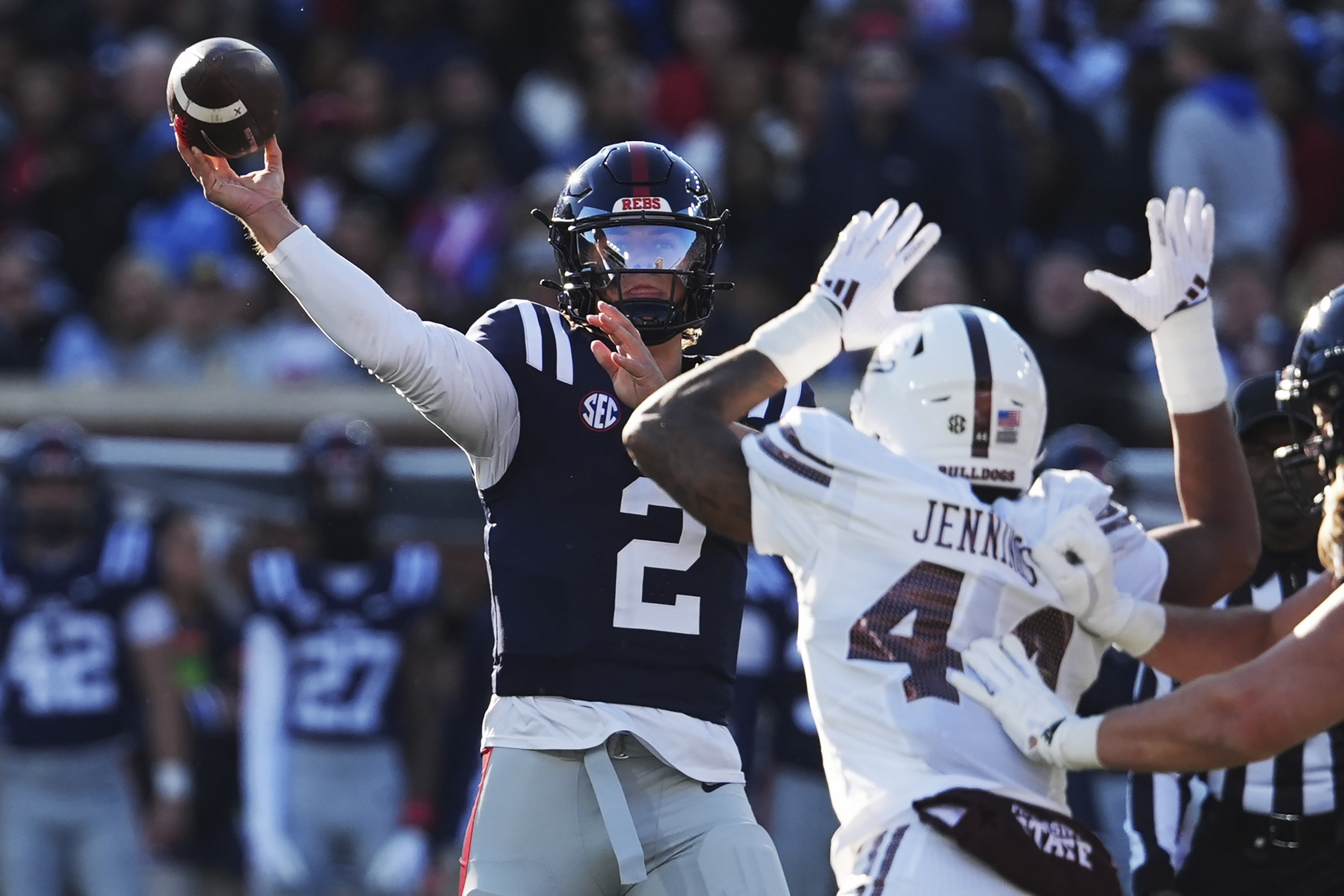 No. 15 Ole Miss beats Mississippi St. 26-14 to win Egg Bowl and keep slim CFP hope alive