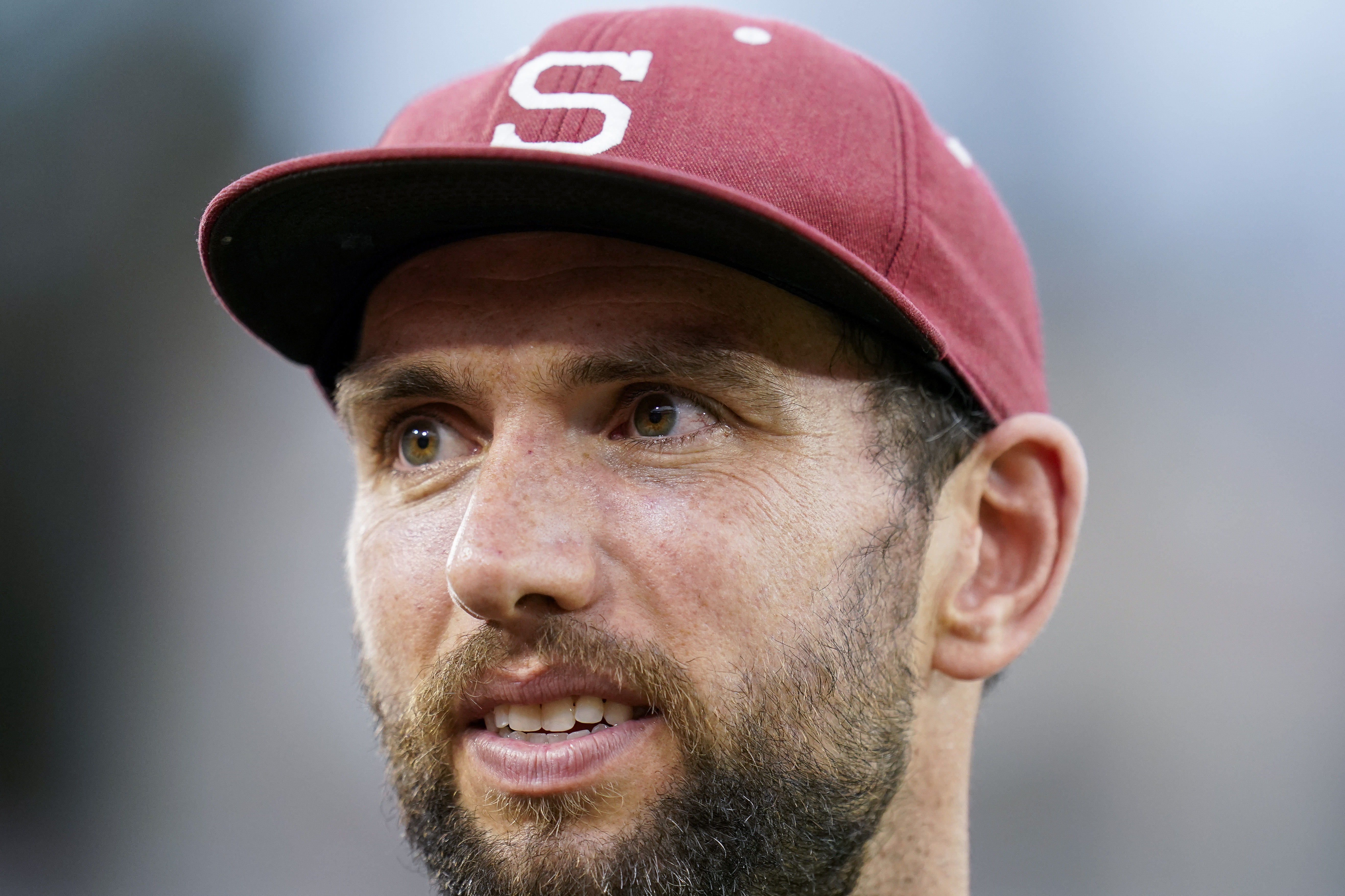 FILE - Former Stanford quarterback Andrew Luck stands on the sideline during the second half of an NCAA college football game against Southern California in Stanford, Calif., Saturday, Sept. 10, 2022. 