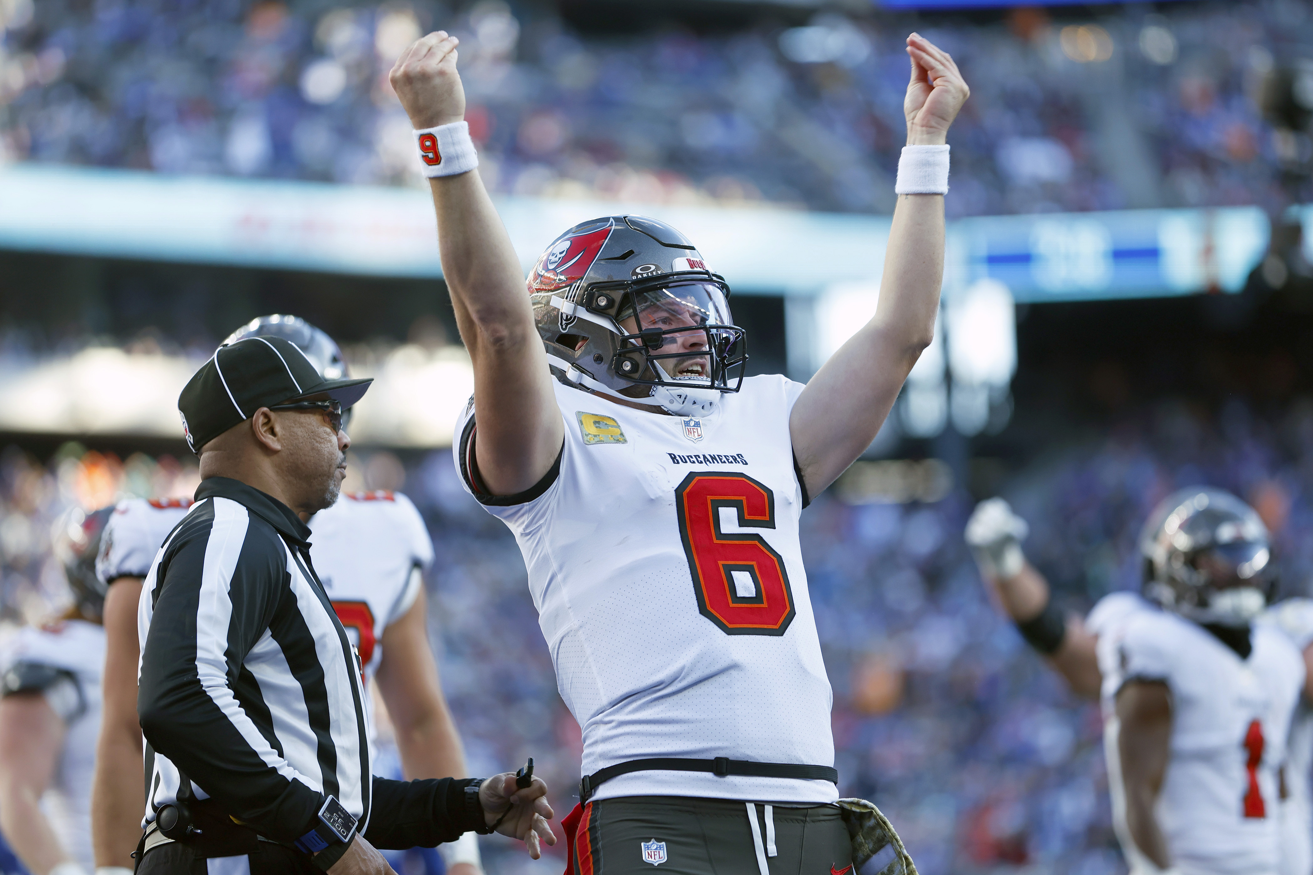 Tampa Bay Buccaneers quarterback Baker Mayfield (6) celebrates his touchdown run against the New York Giants during the first half of an NFL football game Sunday, Nov. 24, 2024, in East Rutherford, N.J.