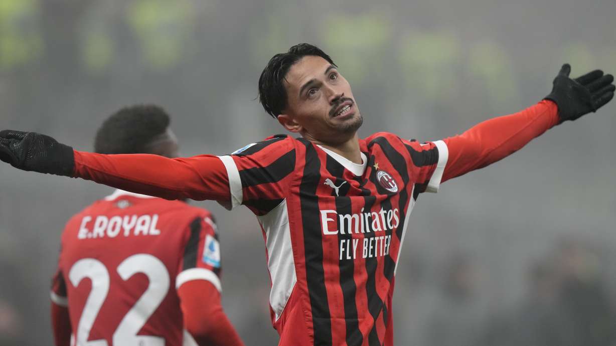 AC Milan's Tijjani Reijnders celebrates scoring his side's third goal during the Italian Serie A soccer match between AC Milan and Empoli, at the Milan San Siro stadium, Italy, Saturday, Nov. 30, 2024.