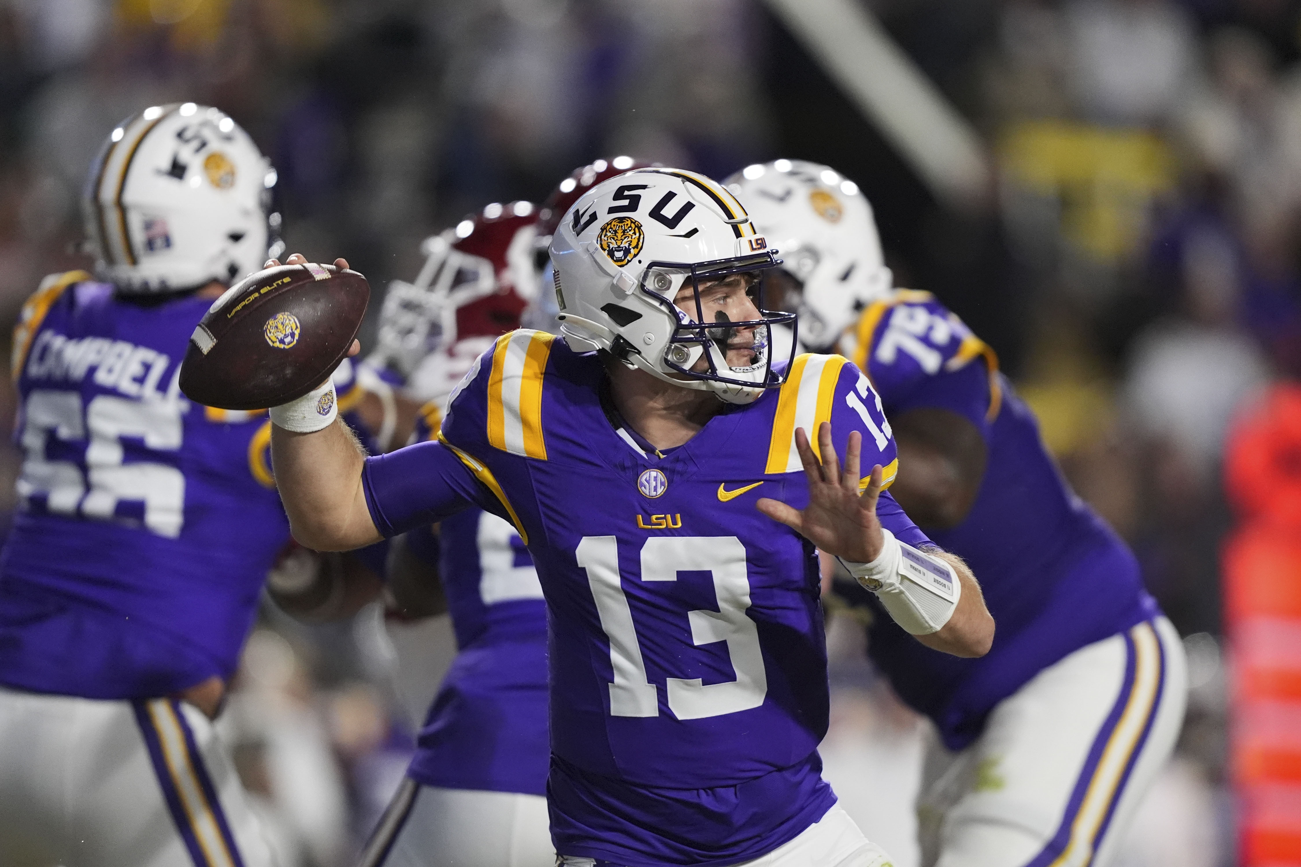 LSU quarterback Garrett Nussmeier (13) passes in the first half an NCAA college football game against Oklahoma in Baton Rouge, La., Saturday, Nov. 30, 2024. 