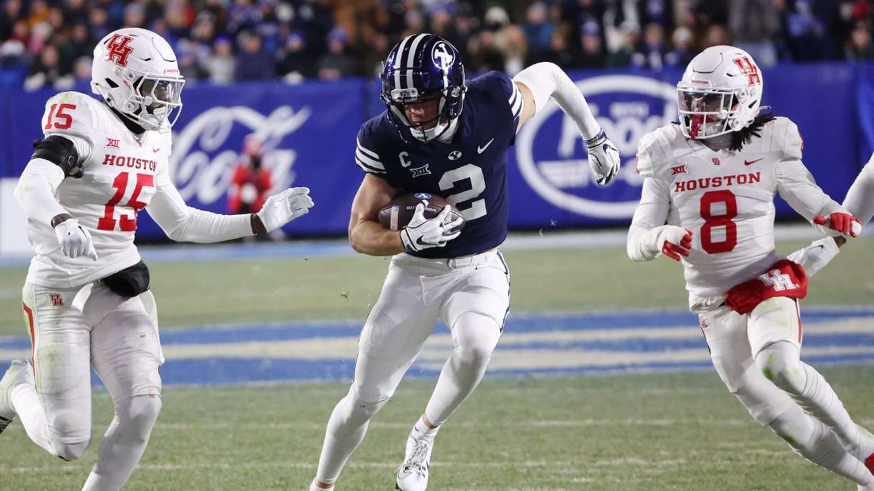 Brigham Young wide receiver Chase Roberts (2) runs after a long catch against the Houston Cougars in Provo on Saturday, Nov. 30, 2024.
