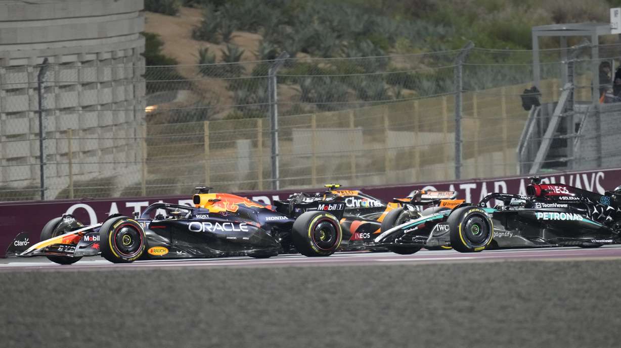 Red Bull driver Max Verstappen of the Netherlands leads at the start during the Qatar Formula One Grand Prix at the Lusail International Circuit in Lusail, Qatar, Sunday, Dec. 1, 2024.