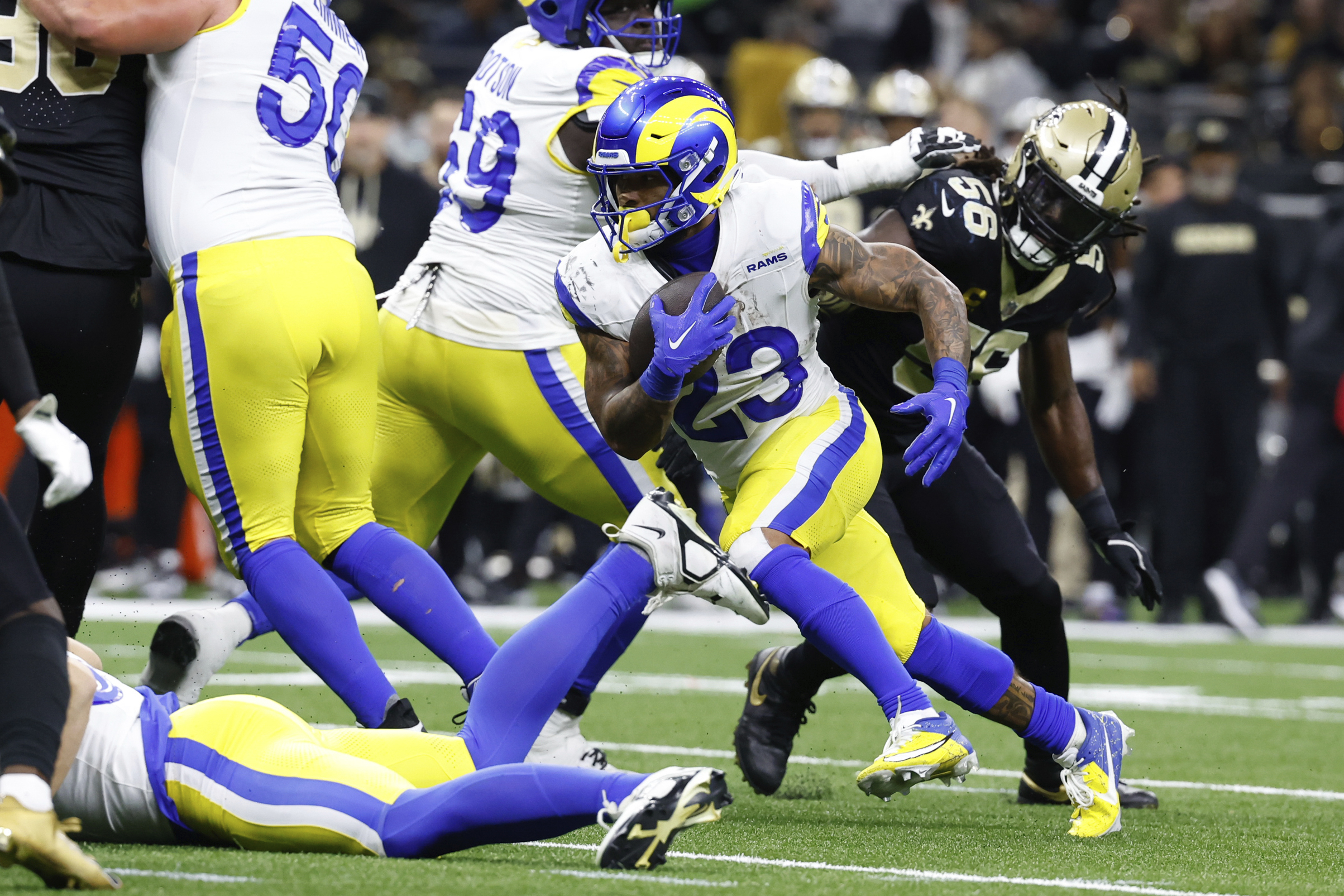 Los Angeles Rams running back Kyren Williams (23) runs for a touchdown during the second half of an NFL football game against the New Orleans Saints, Sunday, Dec. 1, 2024, in New Orleans.