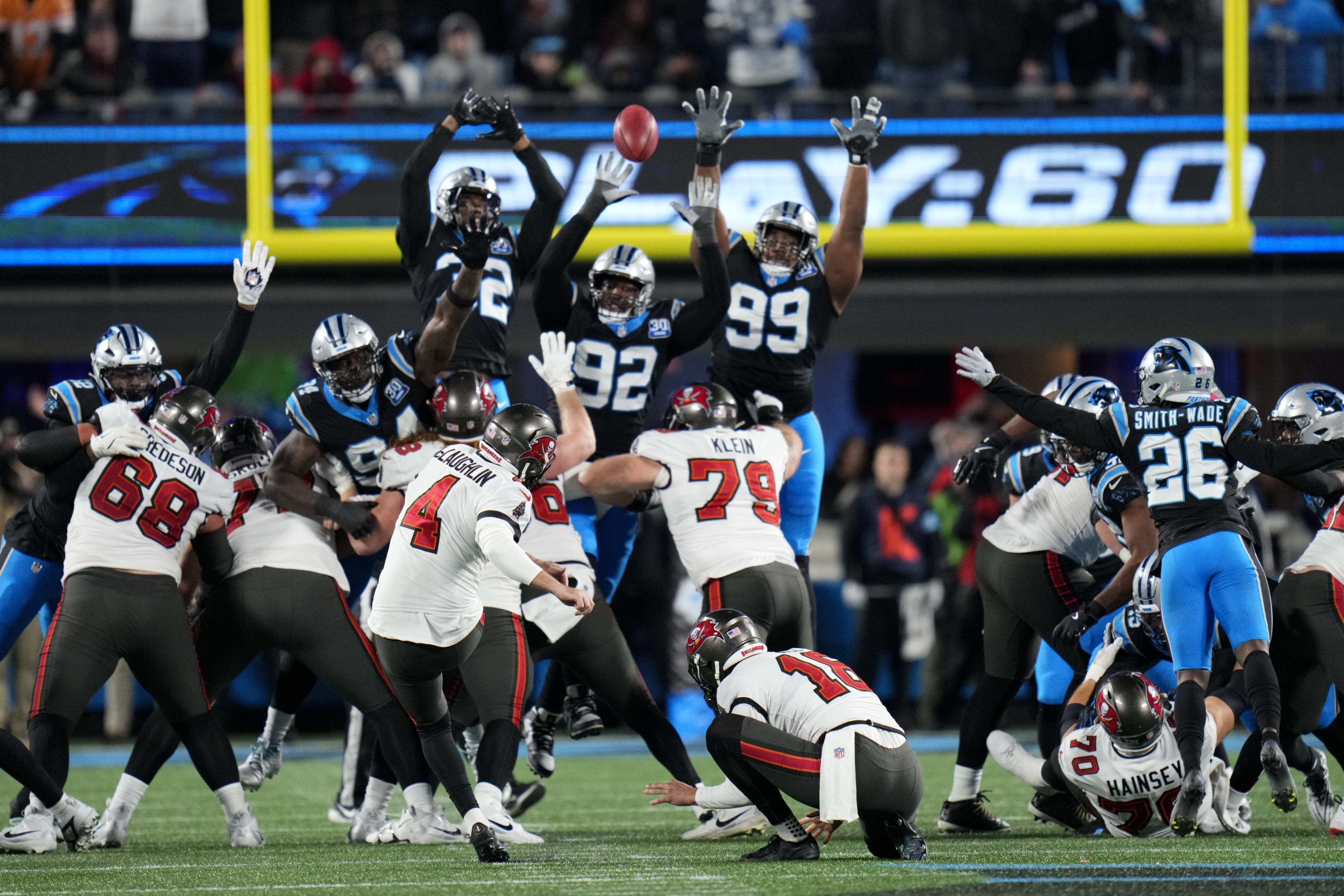 Tampa Bay Buccaneers place kicker Chase McLaughlin kicks a field goal to tie the game during the second half of an NFL football game against the Carolina Panthers, Sunday, Dec. 1, 2024, in Charlotte, N.C.