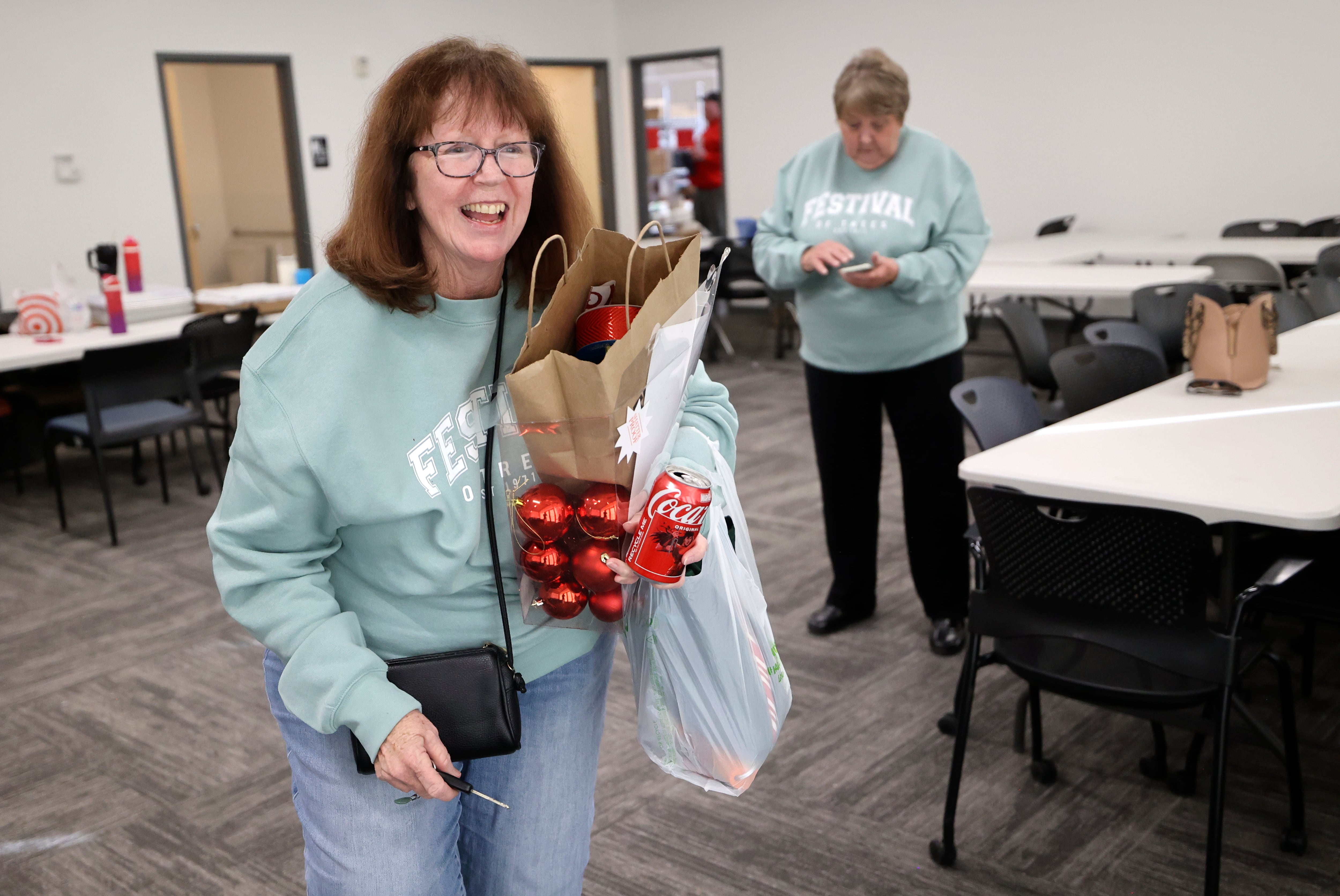 Cathy Strunk, Festival of Trees Alumni Board member, leaves the Festival of Trees warehouse after a meeting in South Salt Lake on Nov. 14.