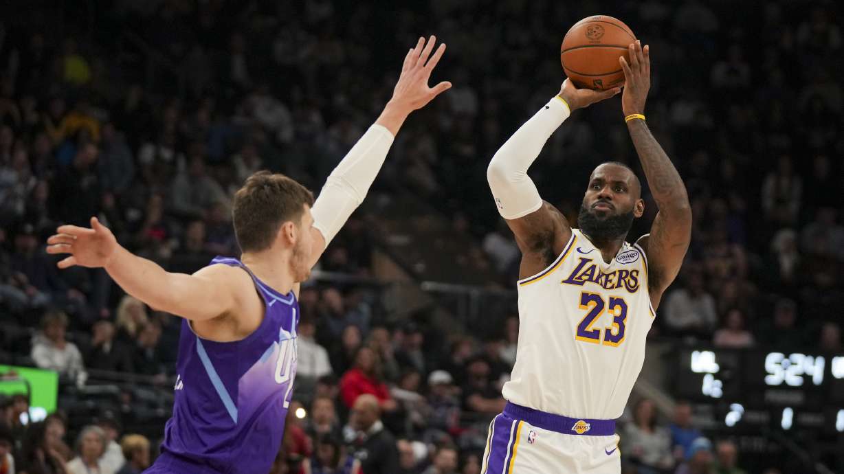 Los Angeles Lakers forward LeBron James (23) shoots the ball as Utah Jazz center Walker Kessler defends during the first half of an NBA basketball game, on Sunday, Dec. 1, 2024, in Salt Lake City.