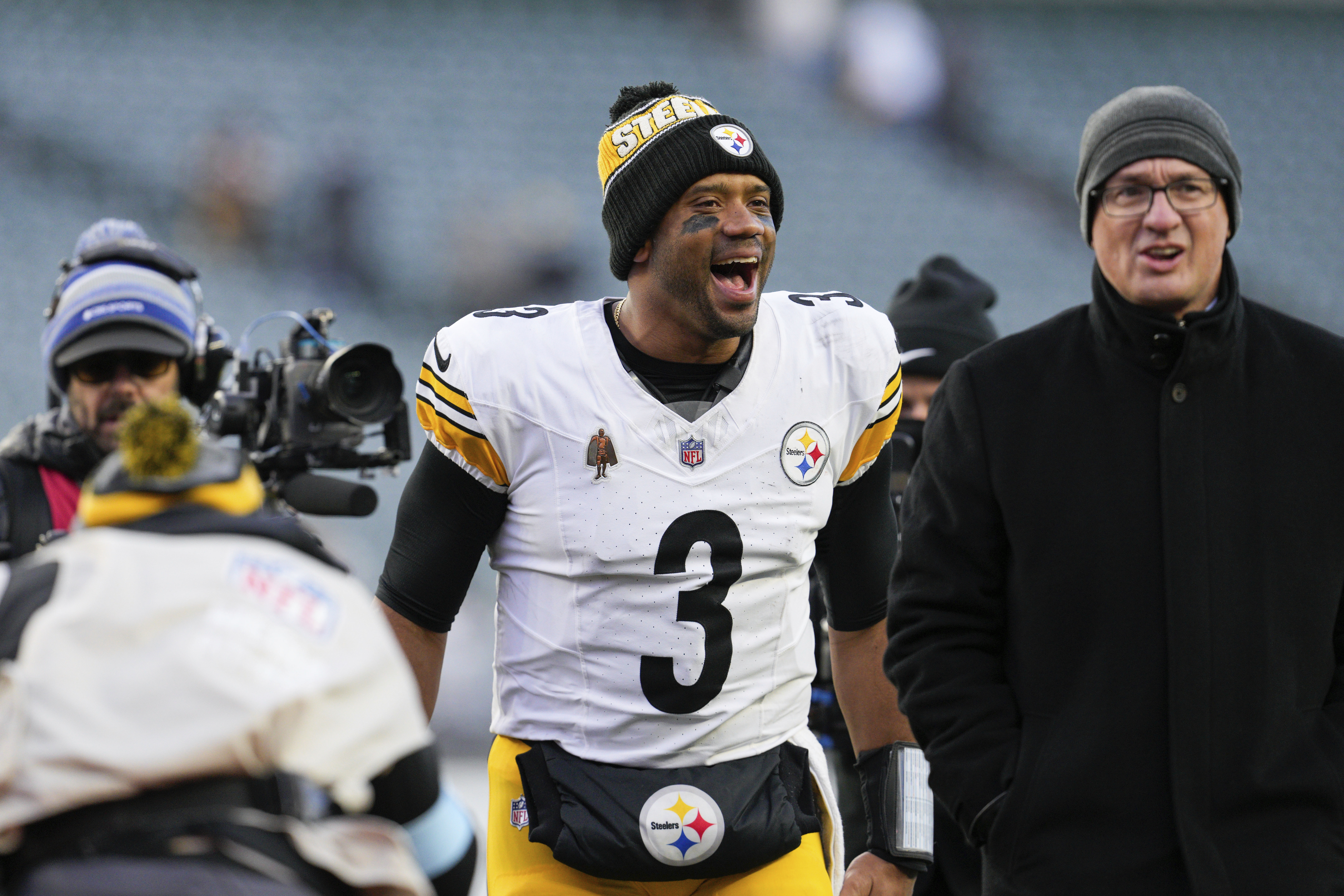 Pittsburgh Steelers quarterback Russell Wilson (3) celebrates as he walks off the field following his team's victory over the Cincinnati Bengals in an NFL football game Sunday, Dec. 1, 2024, in Cincinnati.