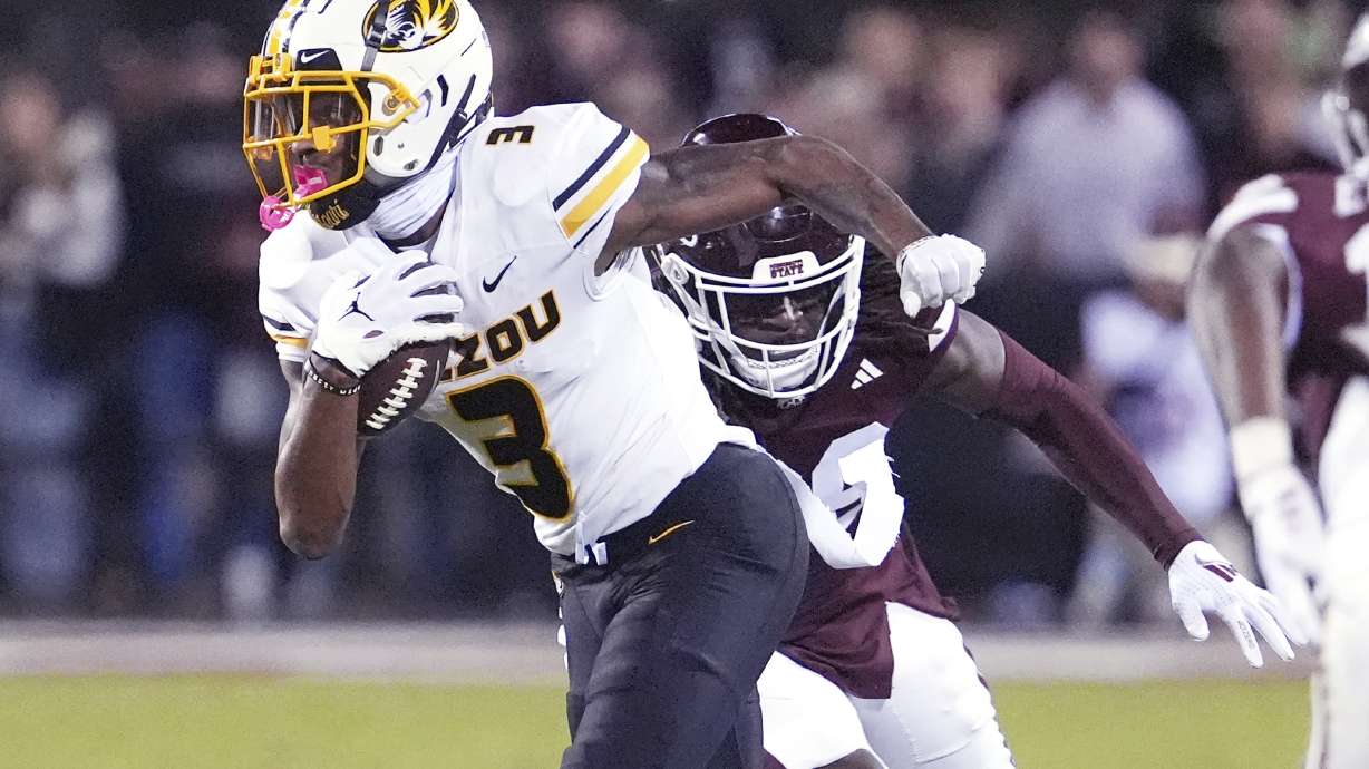 Missouri wide receiver Luther Burden III (3) sprints past a Mississippi State defender with a first down pass reception during the second half of an NCAA college football game, Saturday, Nov. 23, 2024, in Starkville, Miss.