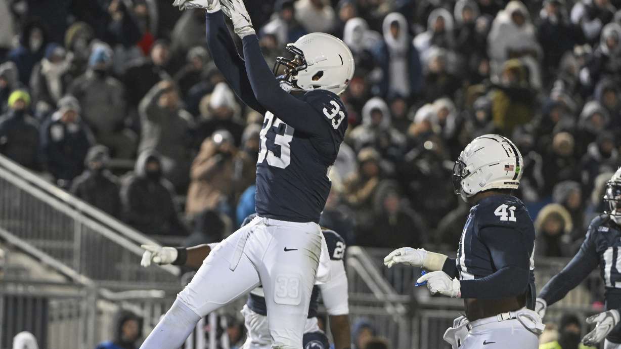 Penn State defensive end Dani Dennis-Sutton (33) celebrates a sack against Maryland during the third quarter of an NCAA college football game, Saturday, Nov. 30, 2024, in State College, Pa.