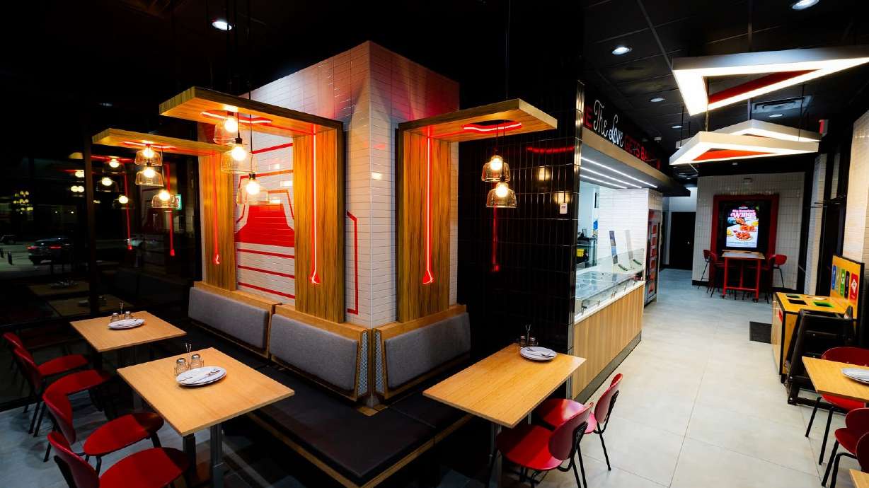 Pizza Hut on Tuesday unveiled a new design concept that features a pizza-making station at the center of the restaurant.